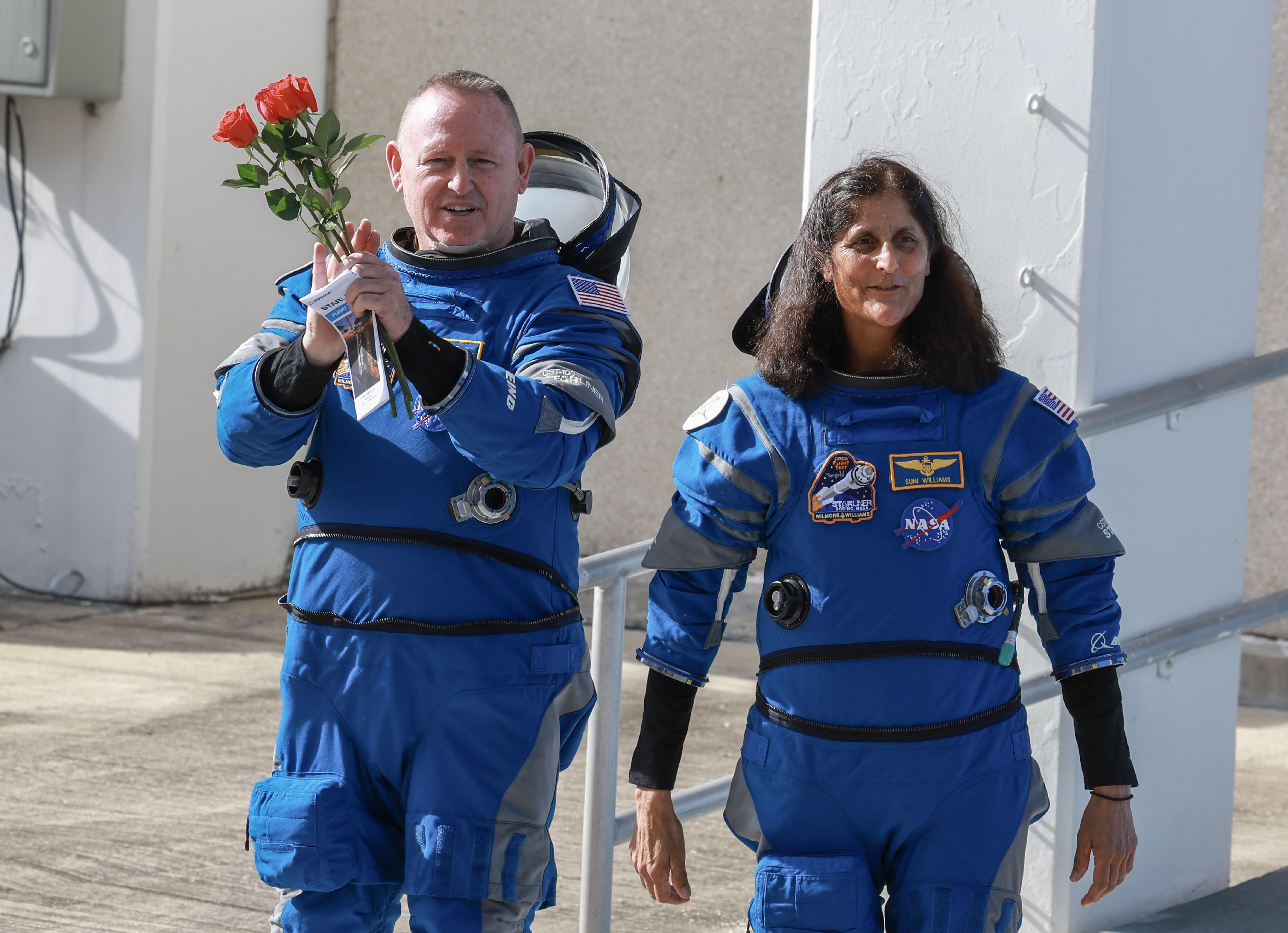 Barry Wilmore and Pilot Sunita Williams walking out of the Operations and Checkout Building on June 5, 2024, in Cape Canaveral, Florida. | Source: Getty Images