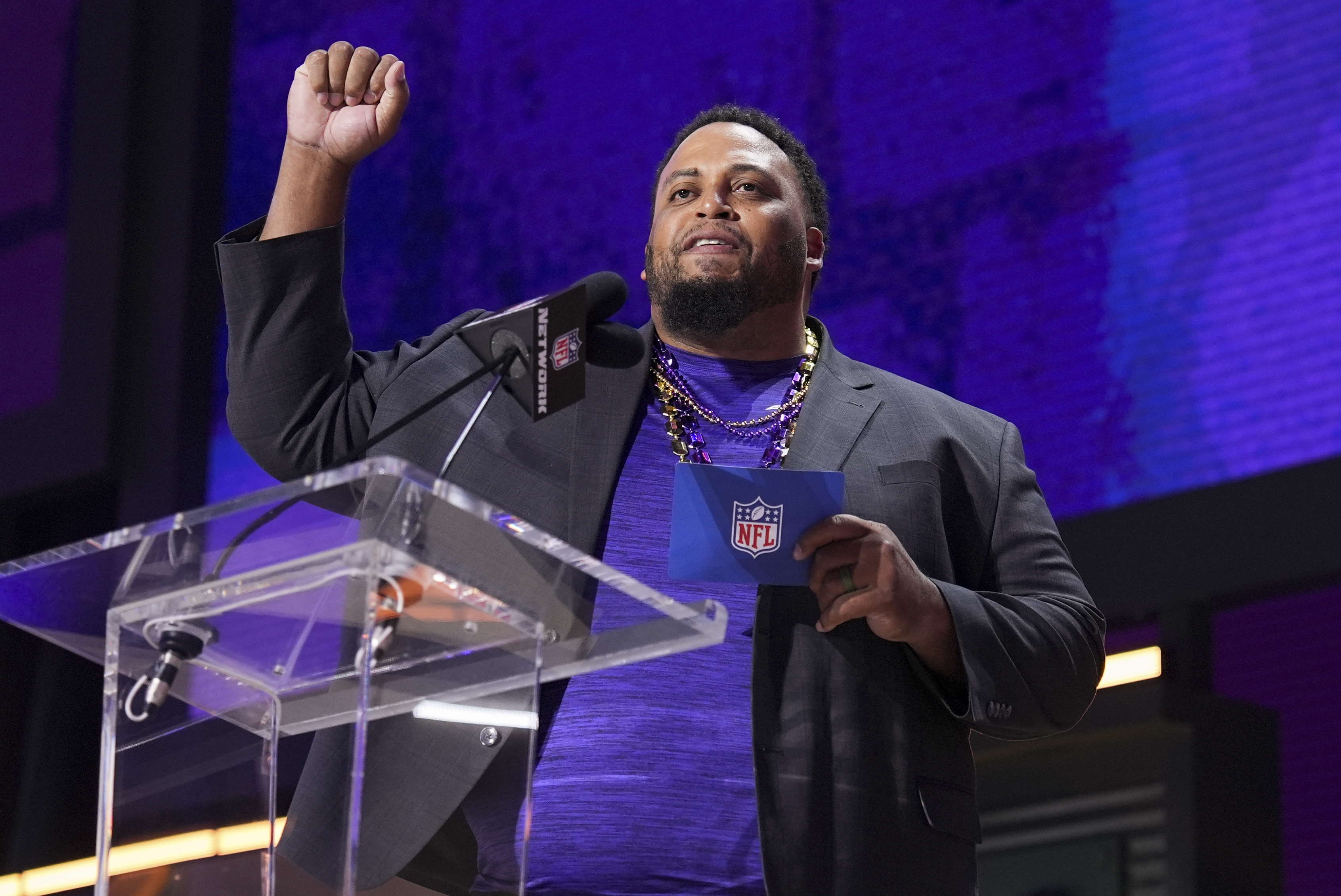 The athlete announces a pick during the second round of the NFL Draft on April 25, 2025, in Green Bay, Wisconsin. | Source: Getty Images