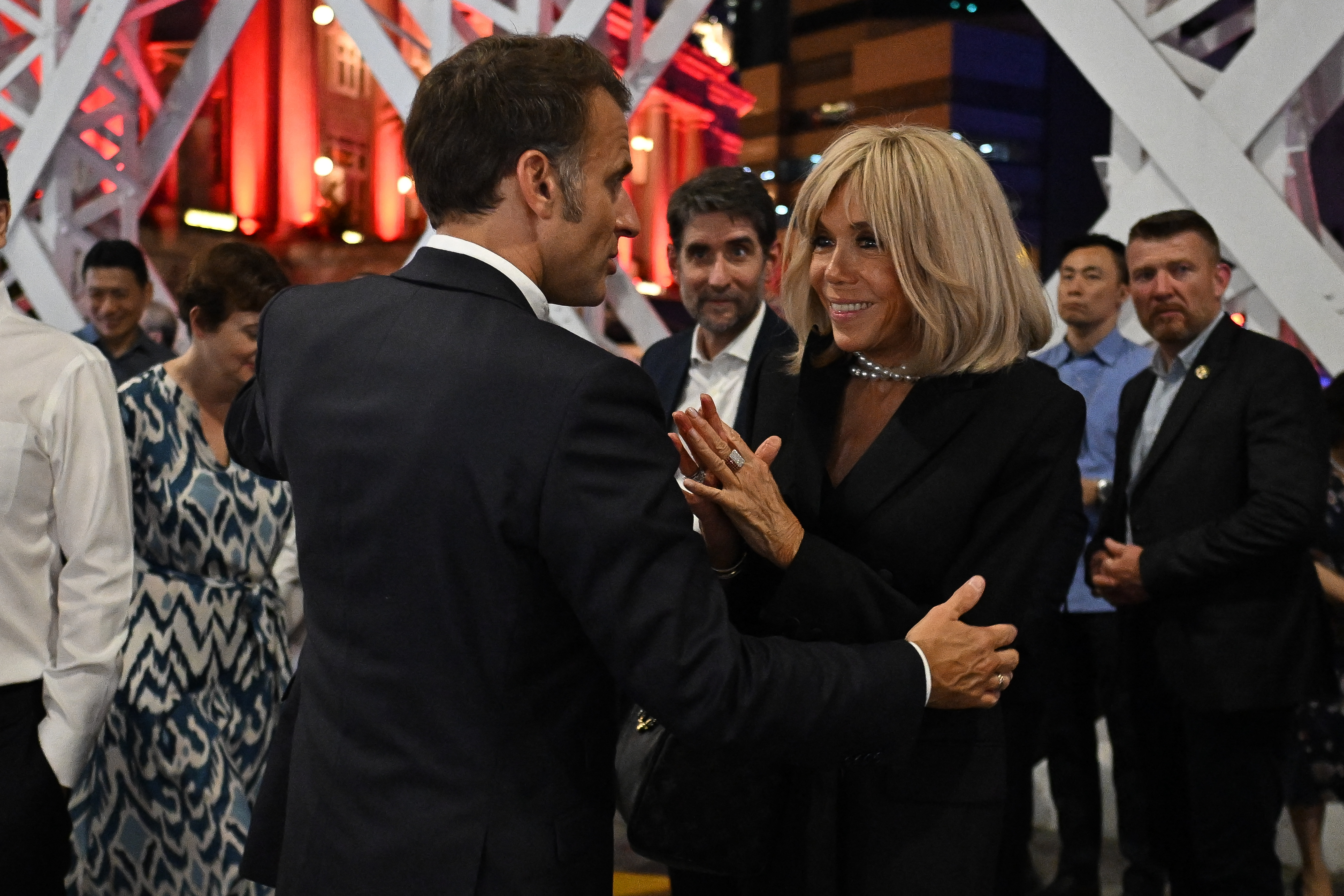 On May 29, 2025, Emmanuel and Brigitte were photographed touring the "Two Rivers" art exhibition on Singapore's Anderson Bridge. The appearance came just days after the controversial airplane moment drew widespread attention. Despite the headlines, the couple maintained their diplomatic schedule abroad.