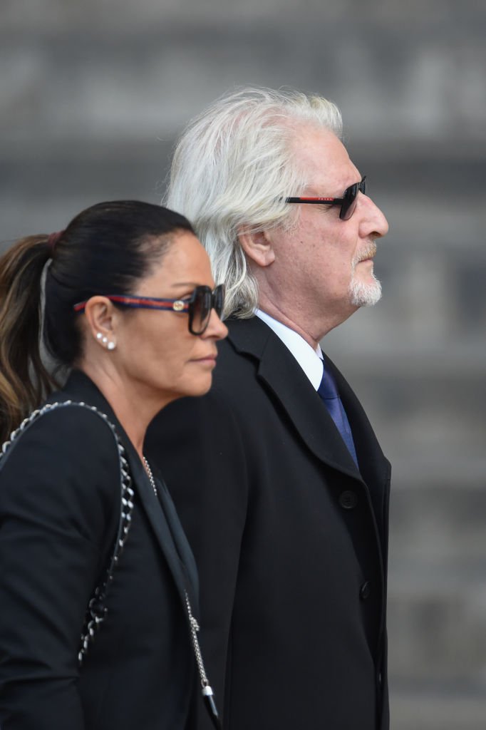 Patrick Sébastien (R) and his wife Nathalie Boutot arrive to attend a religious service for former French President Jacques Chirac at the Saint-Sulpice church on September 30, 2019 in Paris, France. | Photo: Getty Images