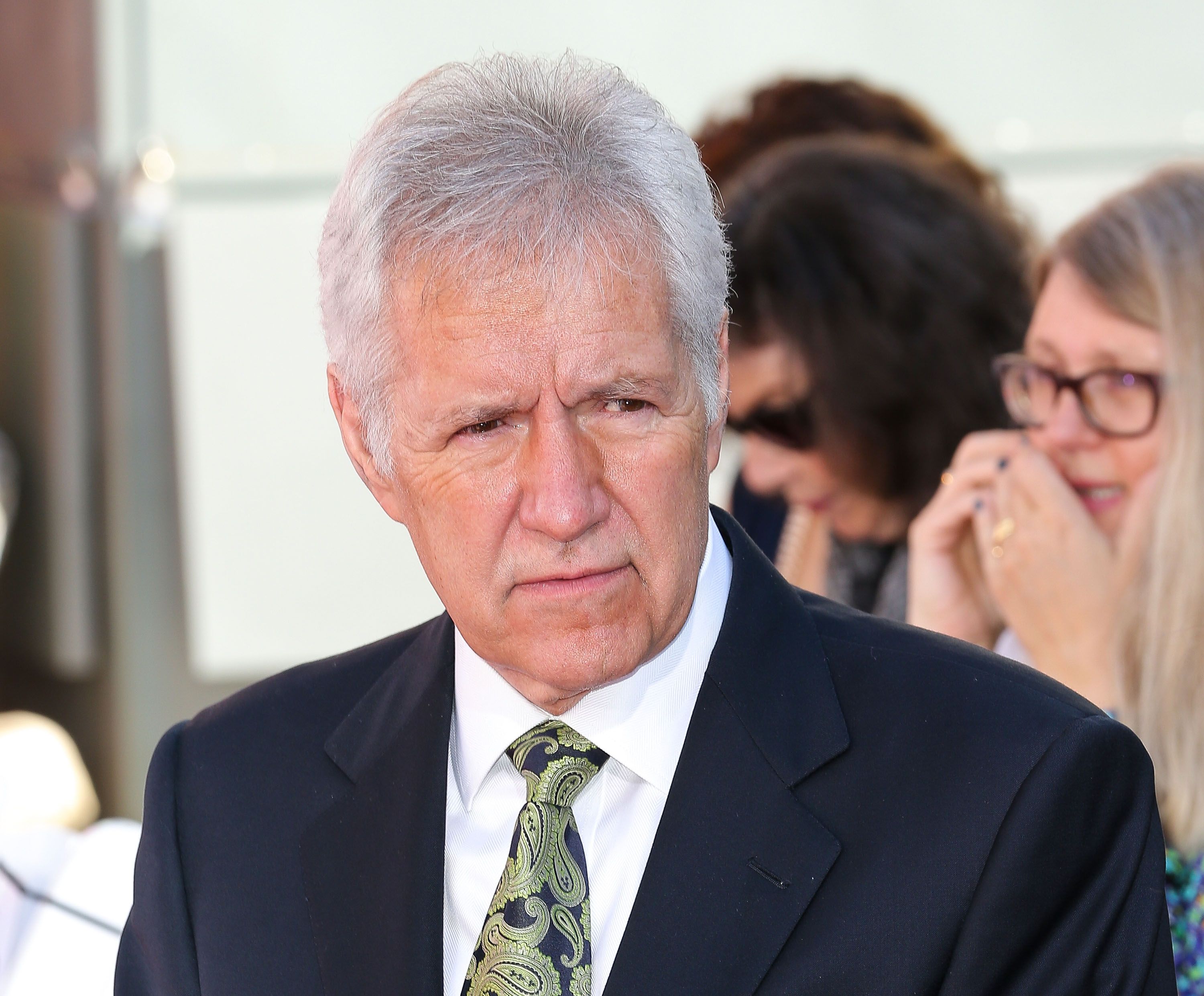 Alex Trebek at the TCM hand and footprint ceremony of  Christopher Plummer on March 27, 2015 | Photo: Getty Images