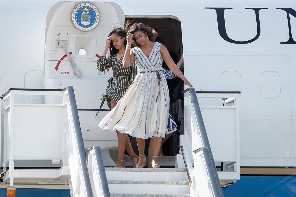 Lady Michelle Obama and her daughter Malia Obama arrive at Torrejon Air Force Base | Photo: Getty Images