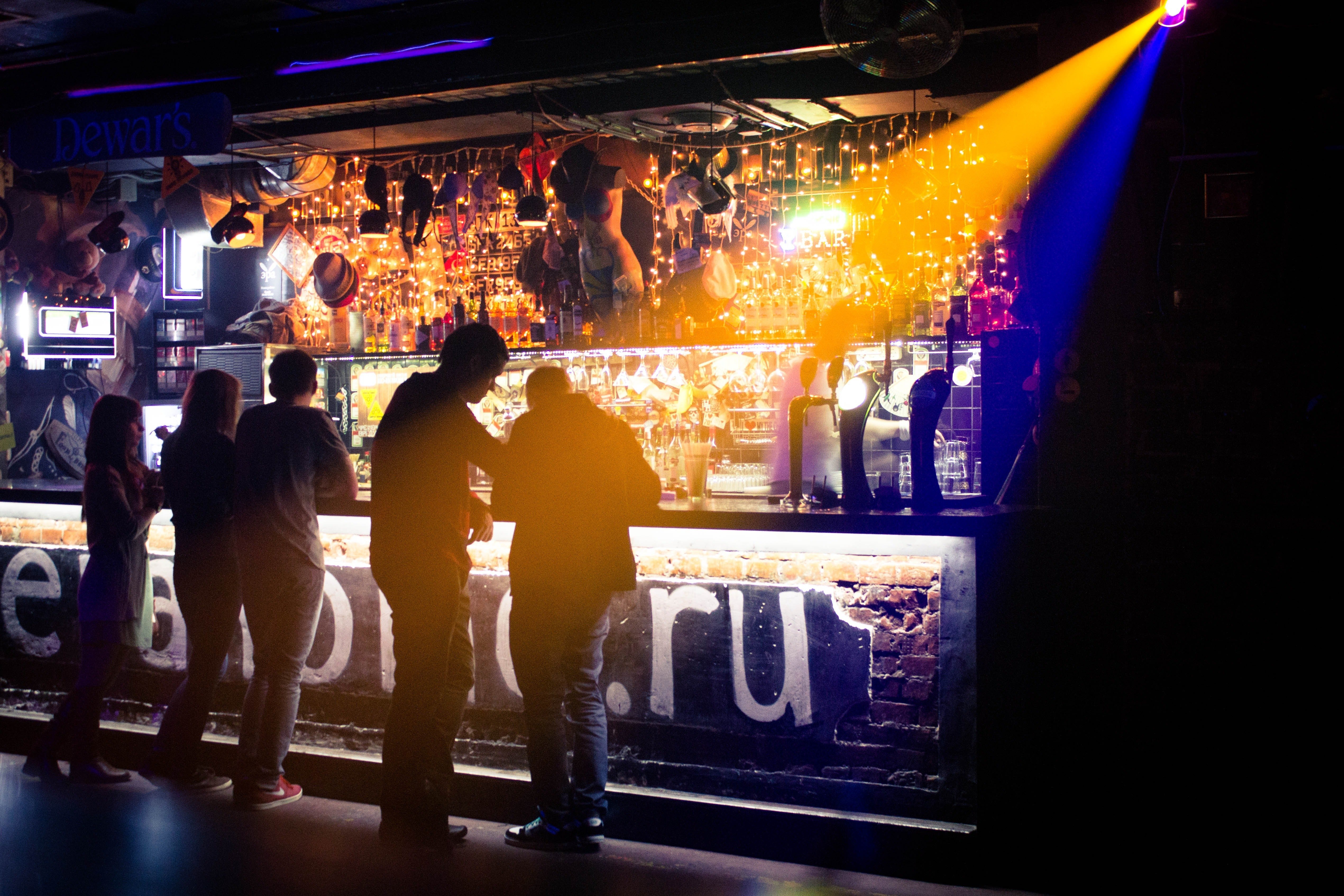 City bar at night. | Source: Pexels