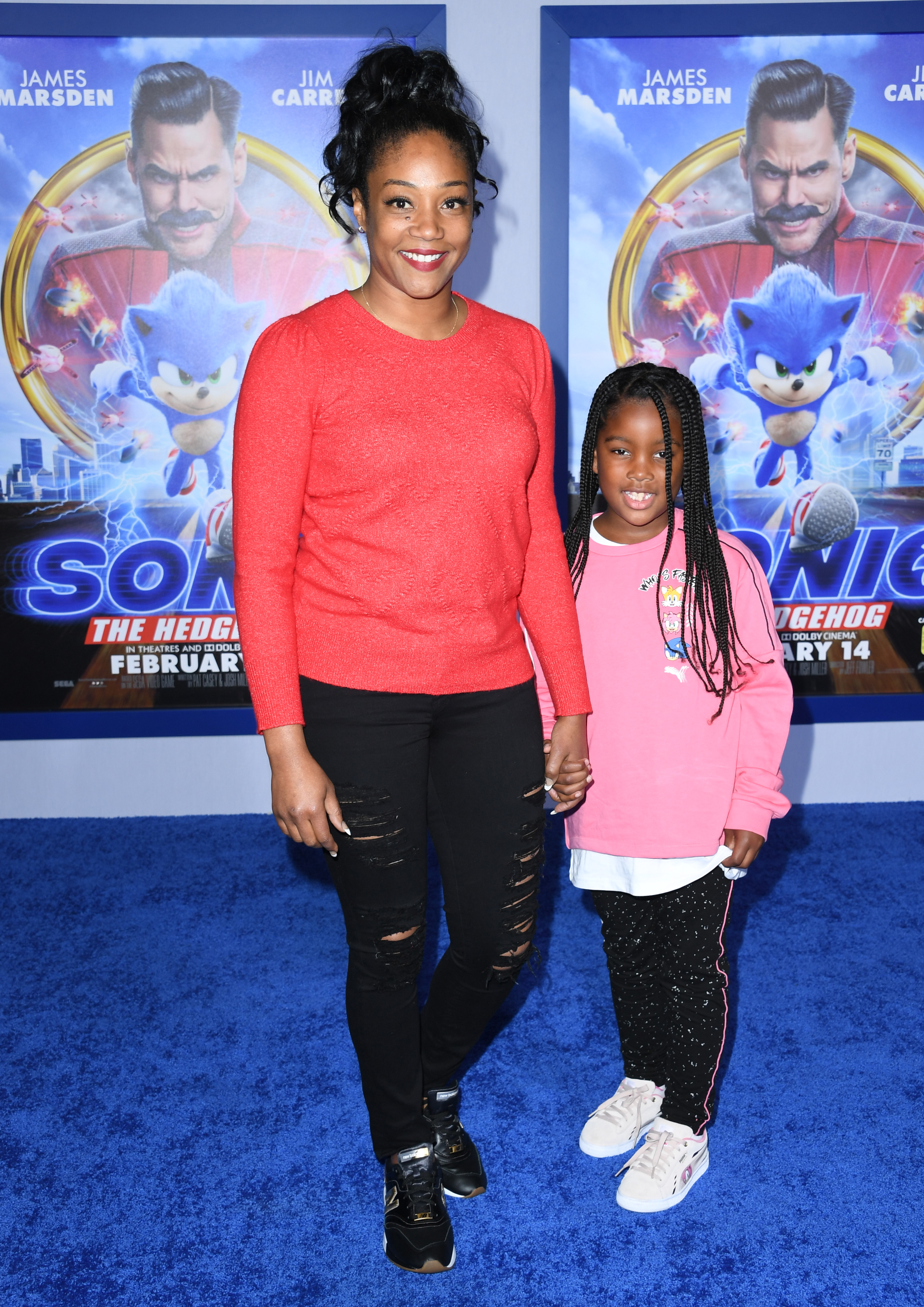 Tiffany Haddish and her goddaughter Cadence Martin at the special screening of "Sonic The Hedgehog" in Westwood, 2020 | Source: Getty Images