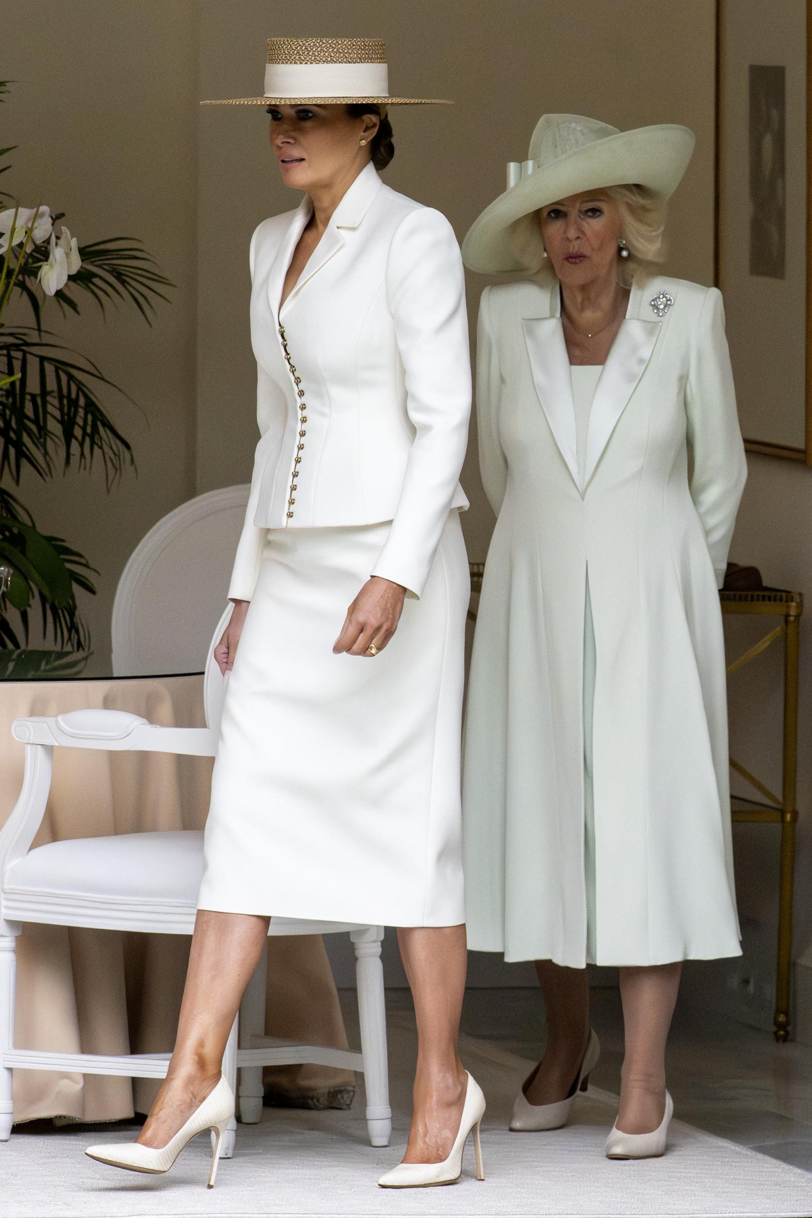 Melania Trump and Britain's Queen Camilla arrive to take part in a youth activity on the White House tennis court area in Washington, DC, on April 28, 2026. | Source: Getty Images