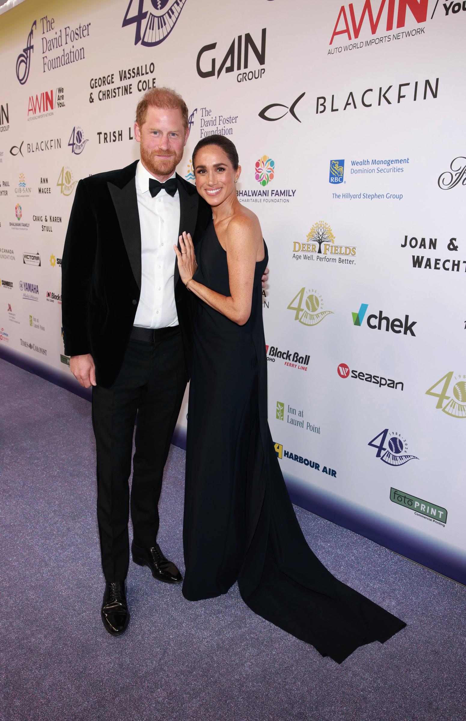 Meghan's gala look featured a Greta Constantine gown and Princess Diana's sapphire and diamond earrings. The appearance came during the David Foster Foundation's 40th anniversary celebrations in Victoria, British Columbia. | Source: Getty Images