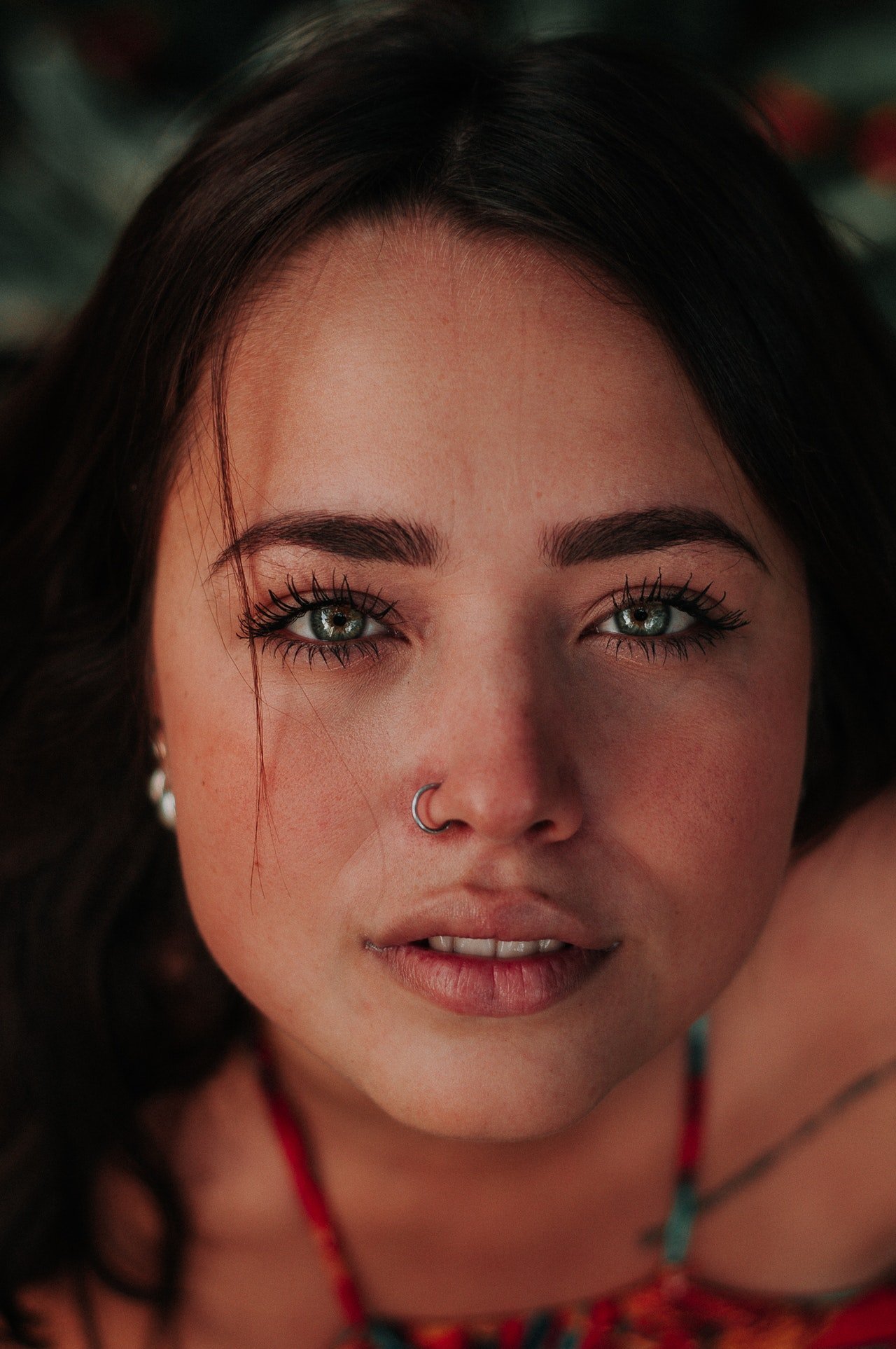 Photo of a woman with a nose piercing | Photo: Pexels