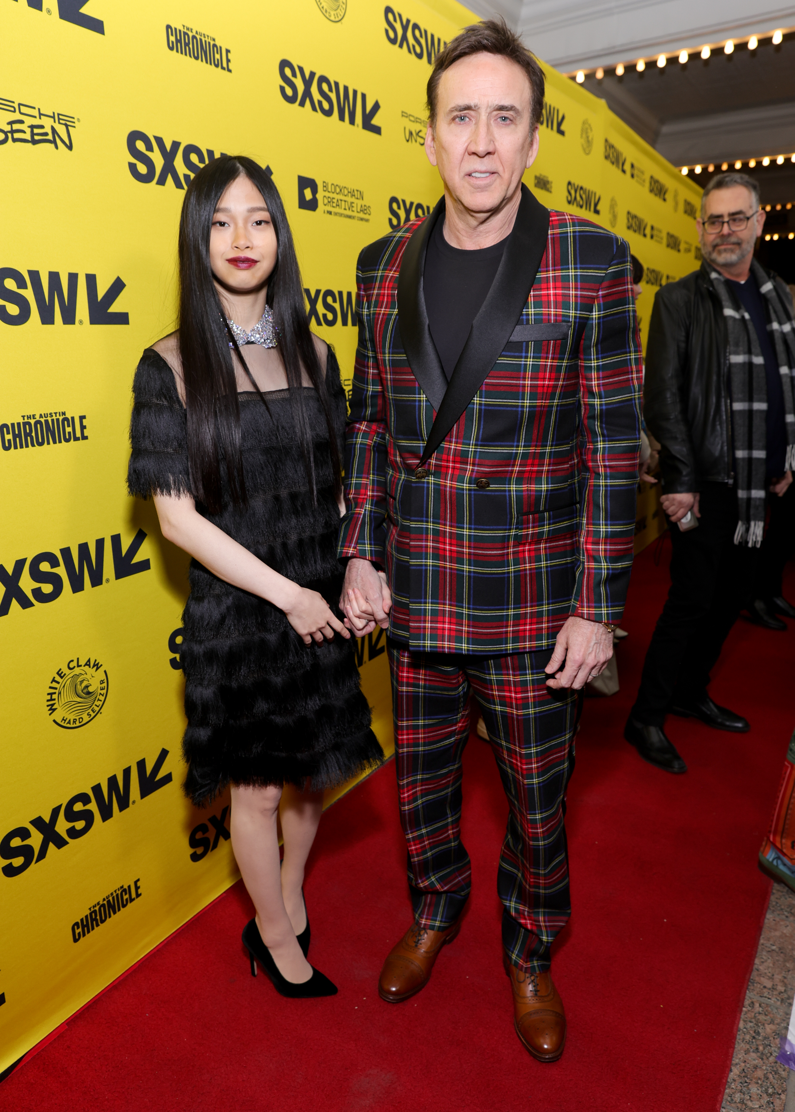 Riko Shibata and Nicolas Cage at the premiere of "The Unbearable Weight of Massive Talent" during the SXSW Conference and Festivals on March 12, 2022, in Austin, Texas | Source: Getty Images