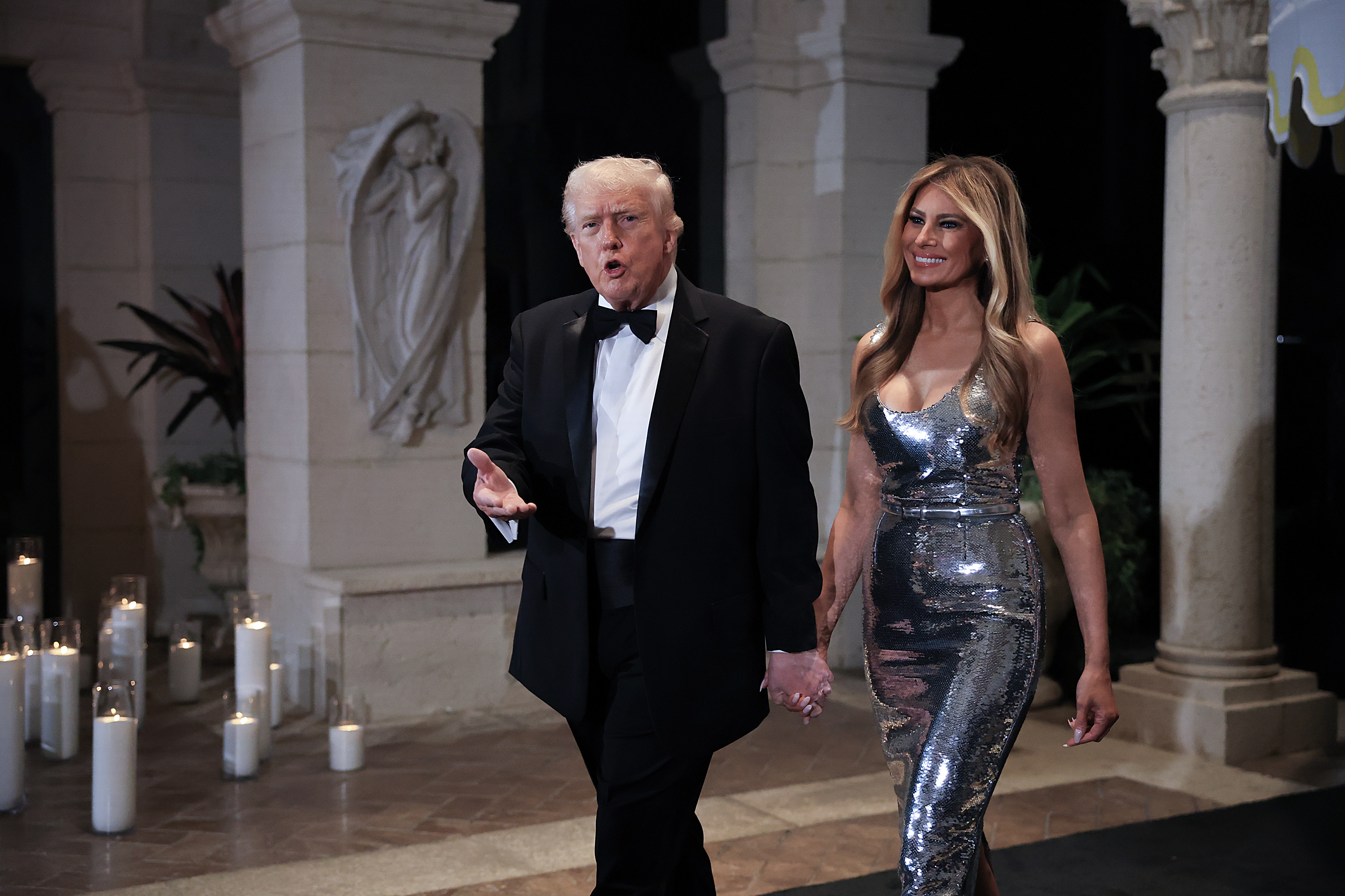 Donald Trump and Melania Trump arrive for a New Year’s Eve event at Mar-a-Lago on December 31, 2025, in Palm Beach, Florida | Source: Getty Images