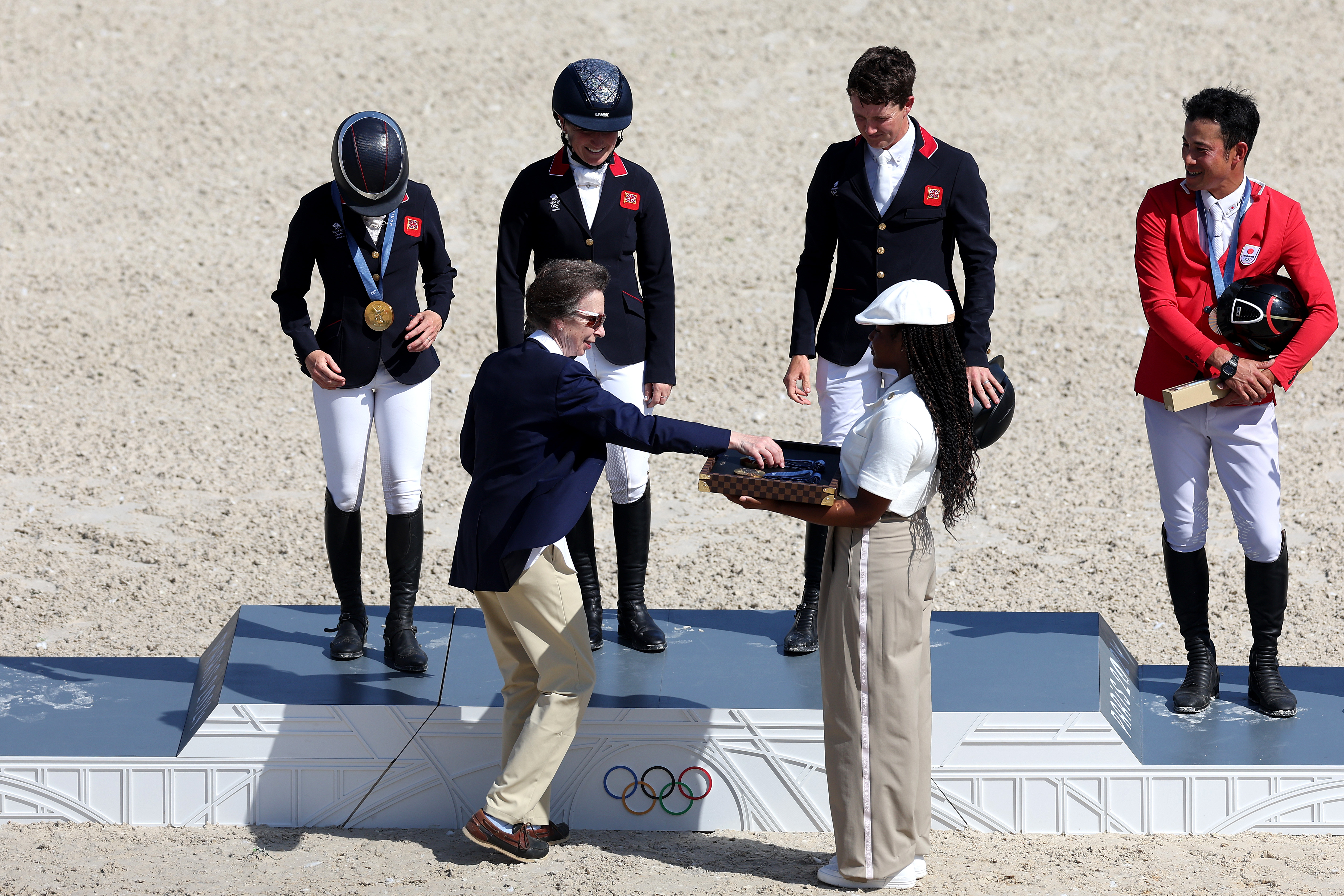 Princess Anne Anne, hands over the gold medals to Team Great Britain during the Olympic Games Paris 2024 at Chateau de Versailles on July 29, 2024, in Versailles, France. | Source: Getty Images