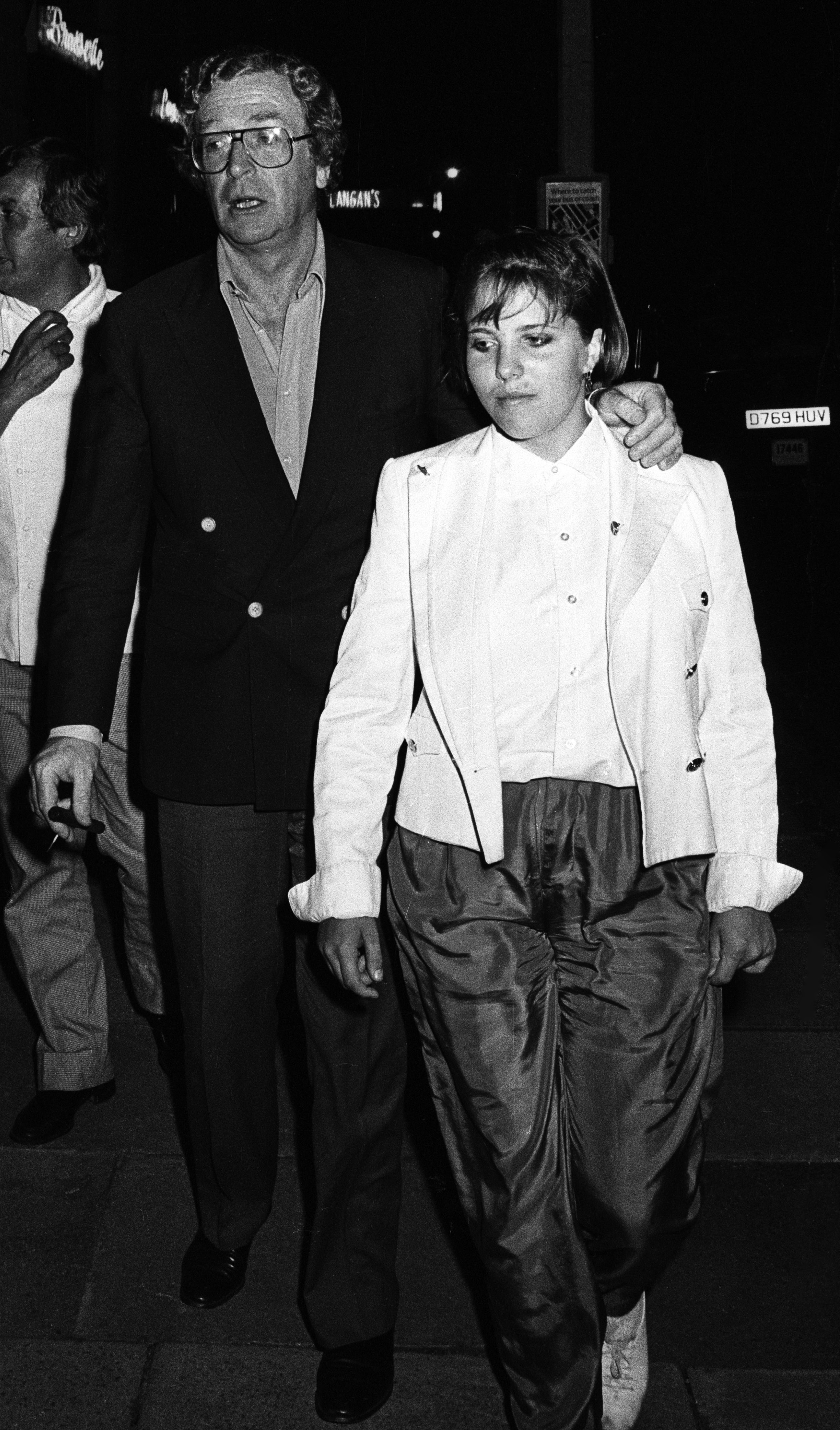 Michael Caine is seen with Natasha at Langan’s Brasserie in London in 1987. Then in her teens, Natasha looked stylish in a smart casual outfit as she walked beside her father, who affectionately rested his arm on her shoulders.