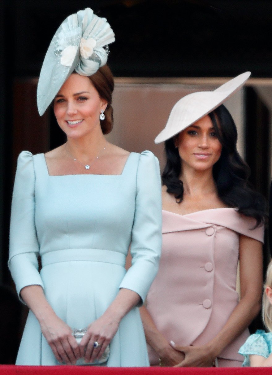 Duchess Kate and Duchess Meghan on the balcony of Buckingham Palace during Trooping The Colour on June 9, 2018, in London, England. | Source: Max Mumby/Indigo/Getty Images