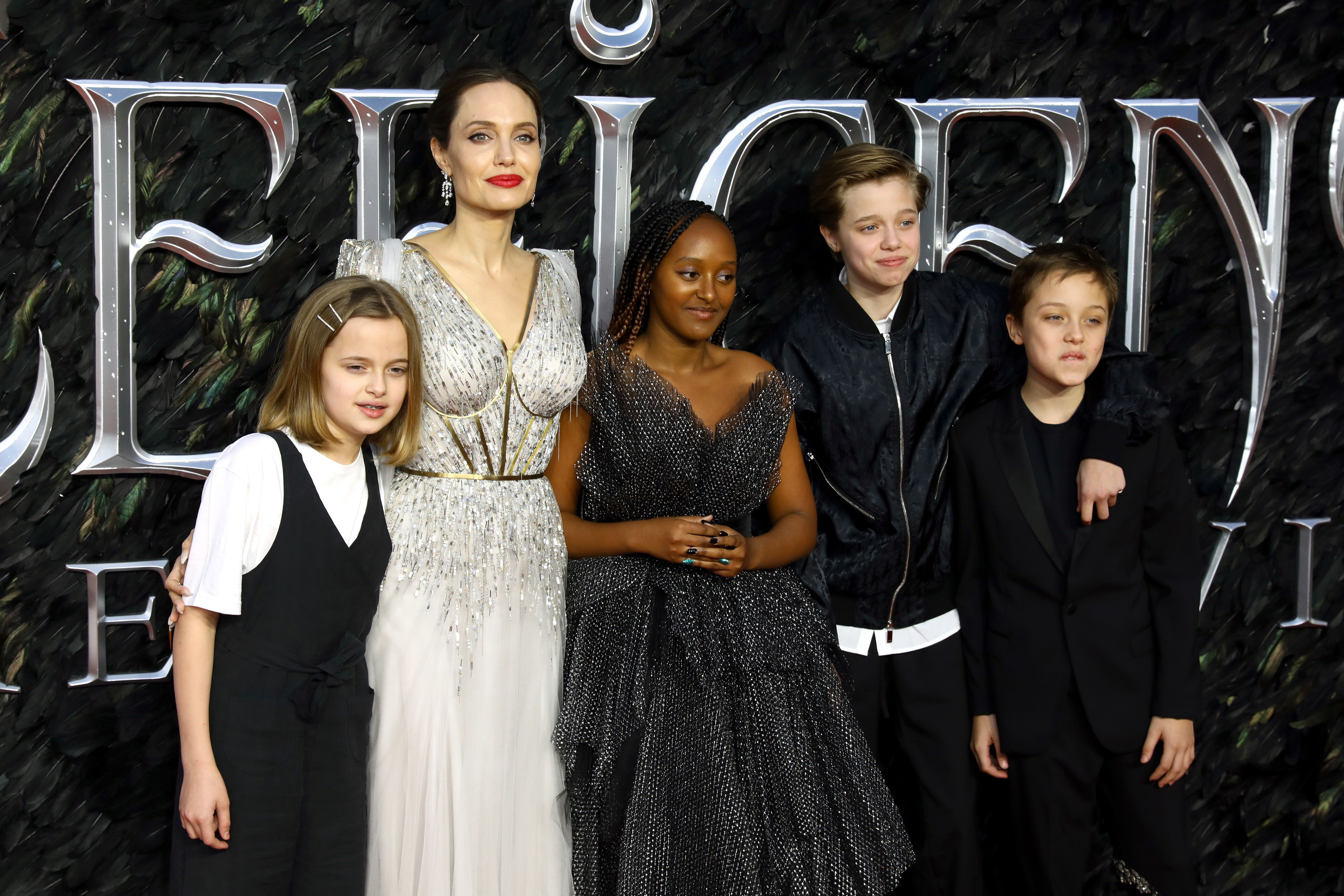 Vivienne Marcheline Jolie-Pitt, Angelina Jolie, Zahara Marley Jolie-Pitt, Shiloh Nouvel Jolie-Pitt and Knox Jolie-Pitt during the European premiere of "Maleficent: Mistress of Evil" at Odeon IMAX Waterloo on October 09, 2019, in London, England. | Source: Getty Images