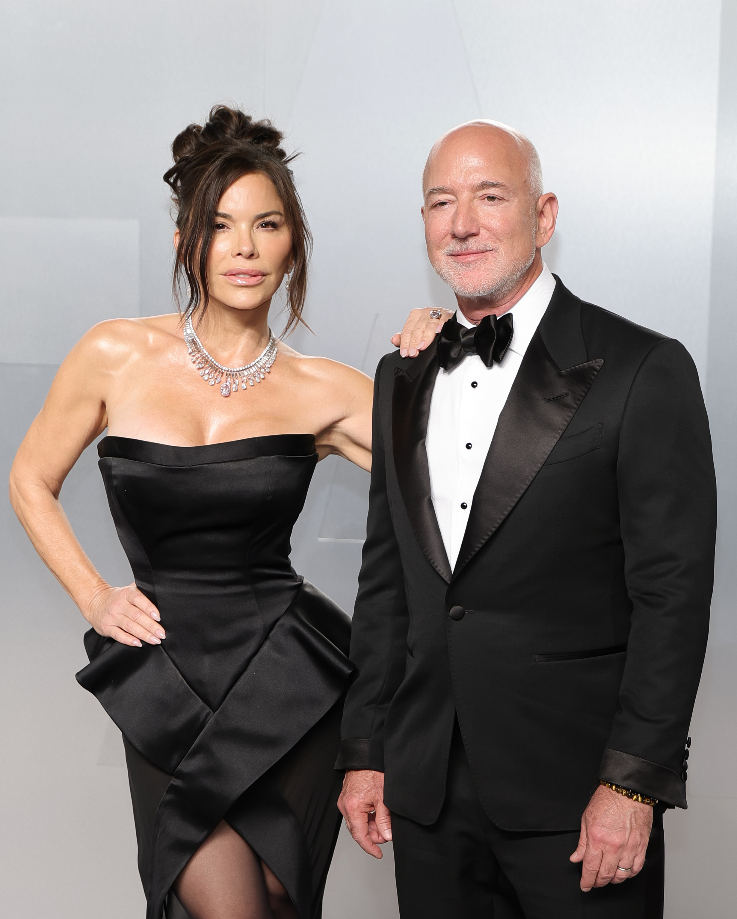 Lauren Sánchez poses beside Jeff Bezos at the 2026 Vanity Fair Oscar Party at the Los Angeles County Museum of Art in California on March 15, 2026. | Source: Getty Images
