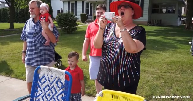 Family gathers to watch 4th of July parade, but gets a surprise when two soldiers step up to them