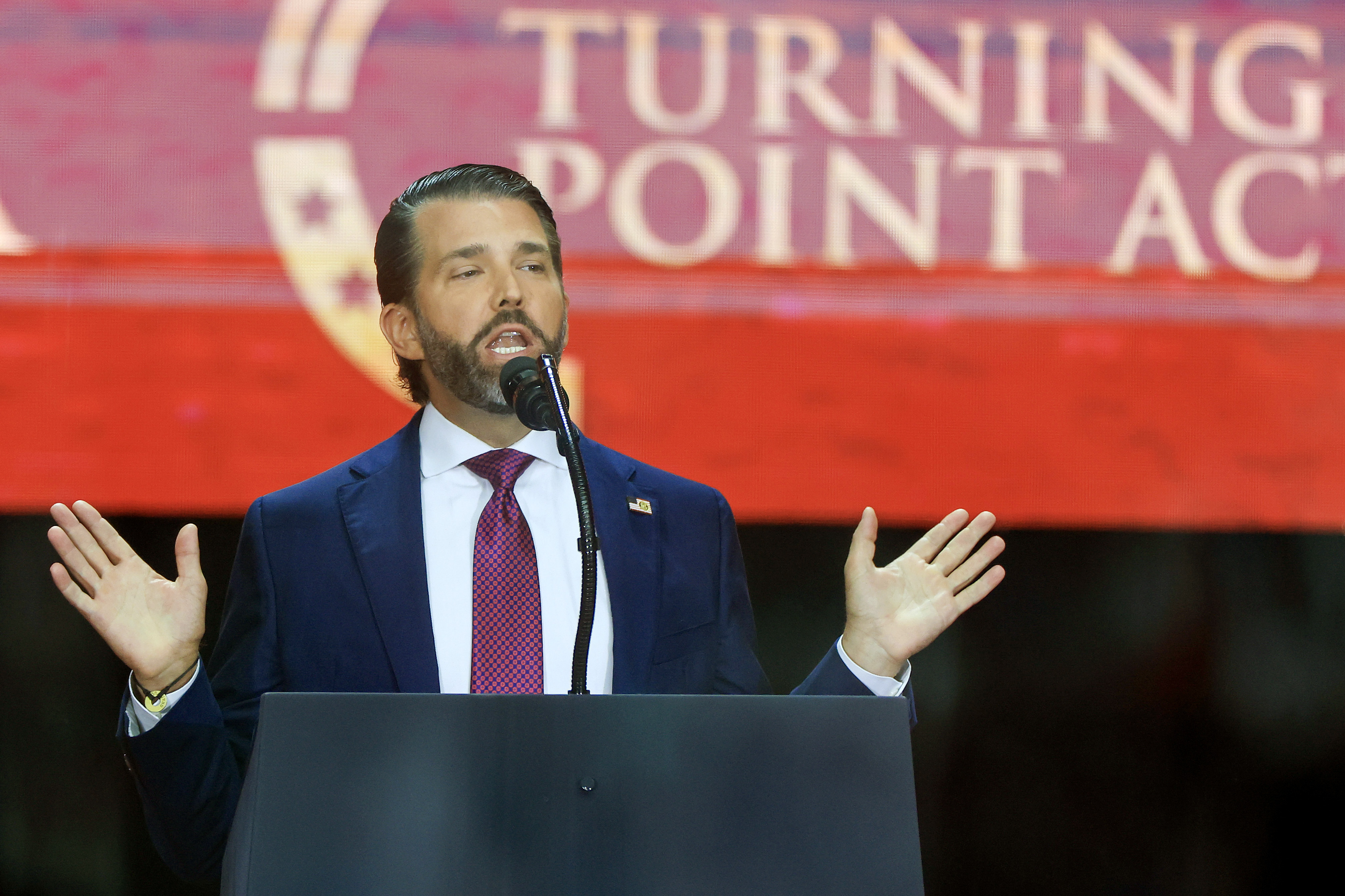 Donald Trump Jr. speaks during the public memorial service for Charlie Kirk at State Farm Stadium on September 21, 2025 | Source: Getty Images