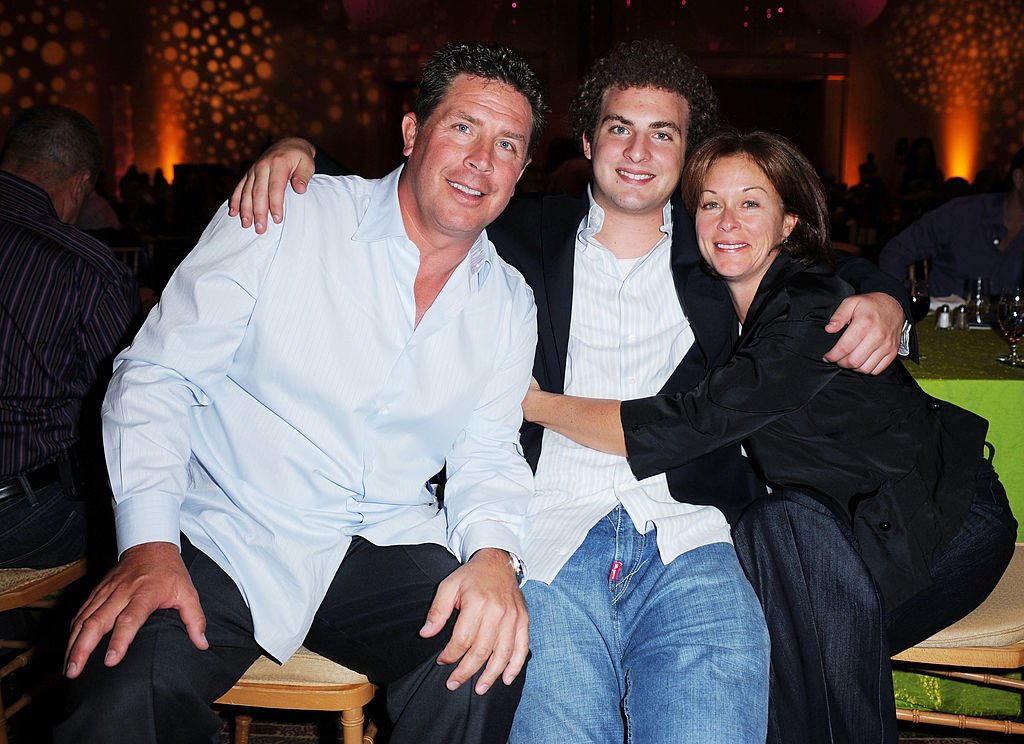 Former Miami Dolphin quaterback Dan Marino poses with his son Michael and wife Claire at the 8th Annual Bubbles and Bows Gala benefitting Here's Help at Westin Diplomat on October 17, 2008 in Hallandale, Florida. | Source: Getty Images