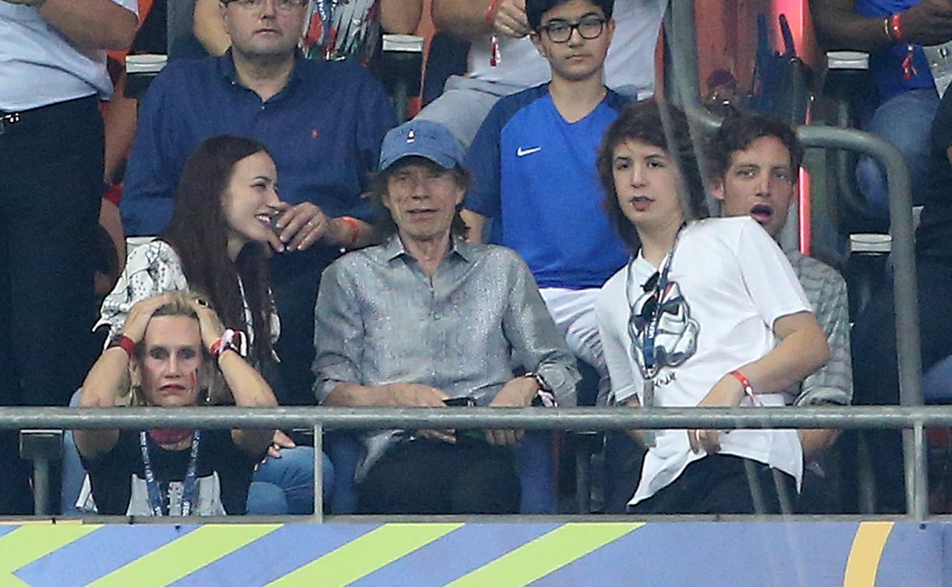 Mick Jagger with his daughter Elizabeth Jagger and his sons James Jagger and Lucas Jagger during the UEFA Euro 2016 final at Stade de France on July 10, 2016 in Saint-Denis near Paris, France ┃ Source: Getty Images