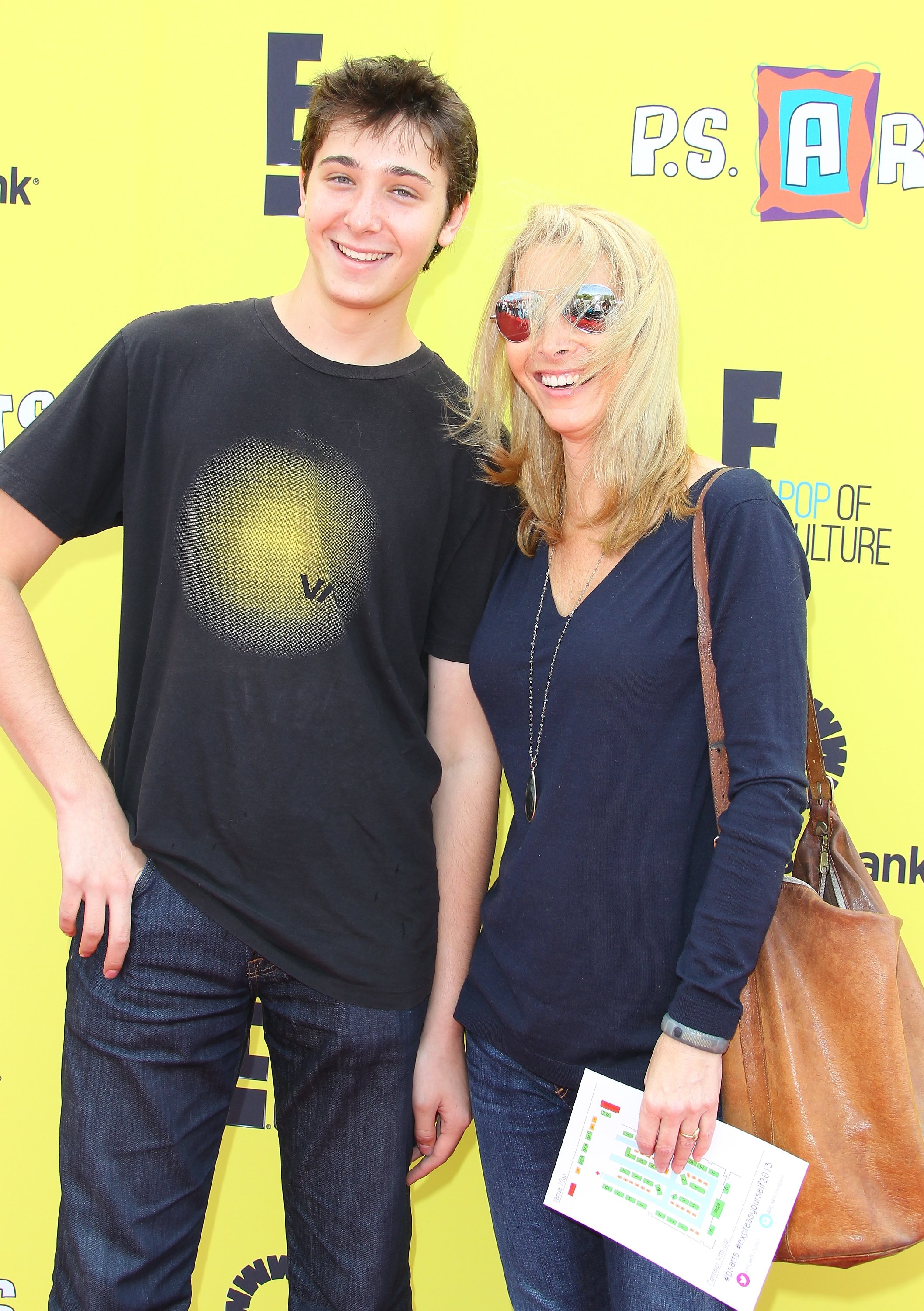 Julian Murray Stern and Lisa Kudrow attend the P.S. Arts Express Yourself 2013 at Barker Hangar on November 17, 2013, in Santa Monica, California | Source: Getty Images