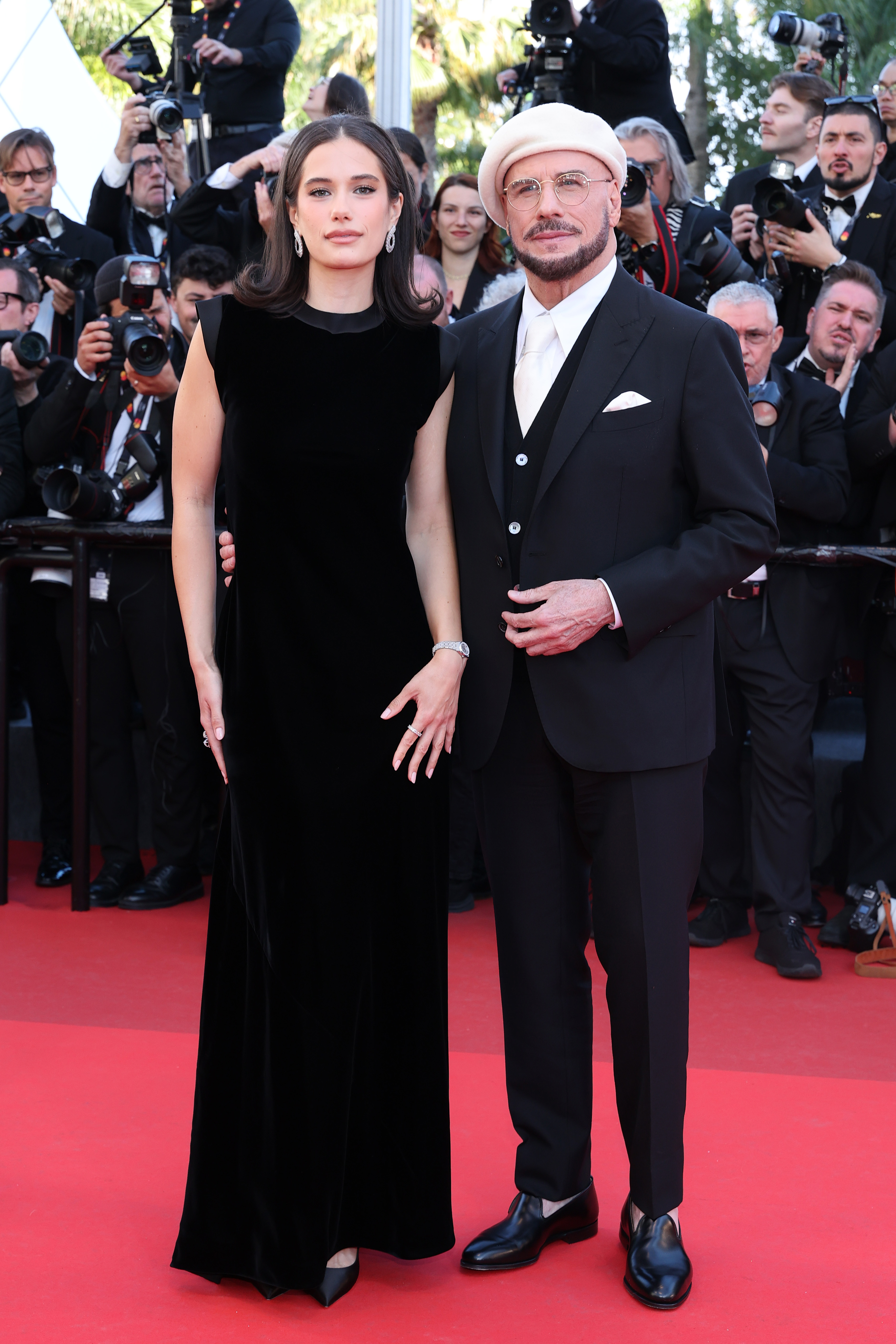 John and Ella Bleu Travolta attend the "Karma" screening during the 79th annual Cannes Film Festival at Palais des Festivals on May 15, 2026 in Cannes, France. | Source: Getty Images