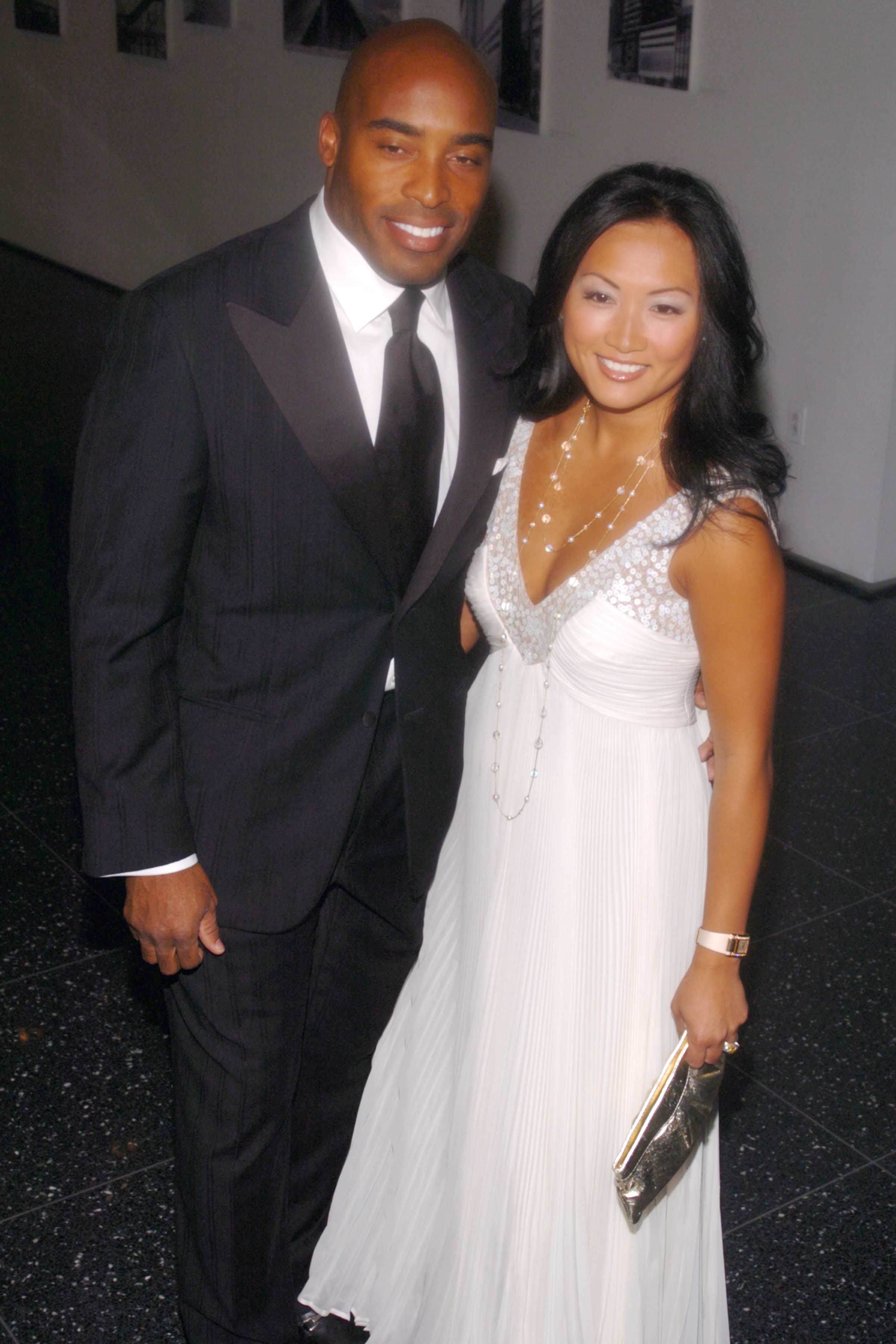 Tiki Barber and Ginny Cha attend The 38th Annual Party in the Garden to honor Joan Tisch and Sarah Jessica Parker at The Museum of Modern Art on June 6, 2006, in New York City. | Source: Getty Images