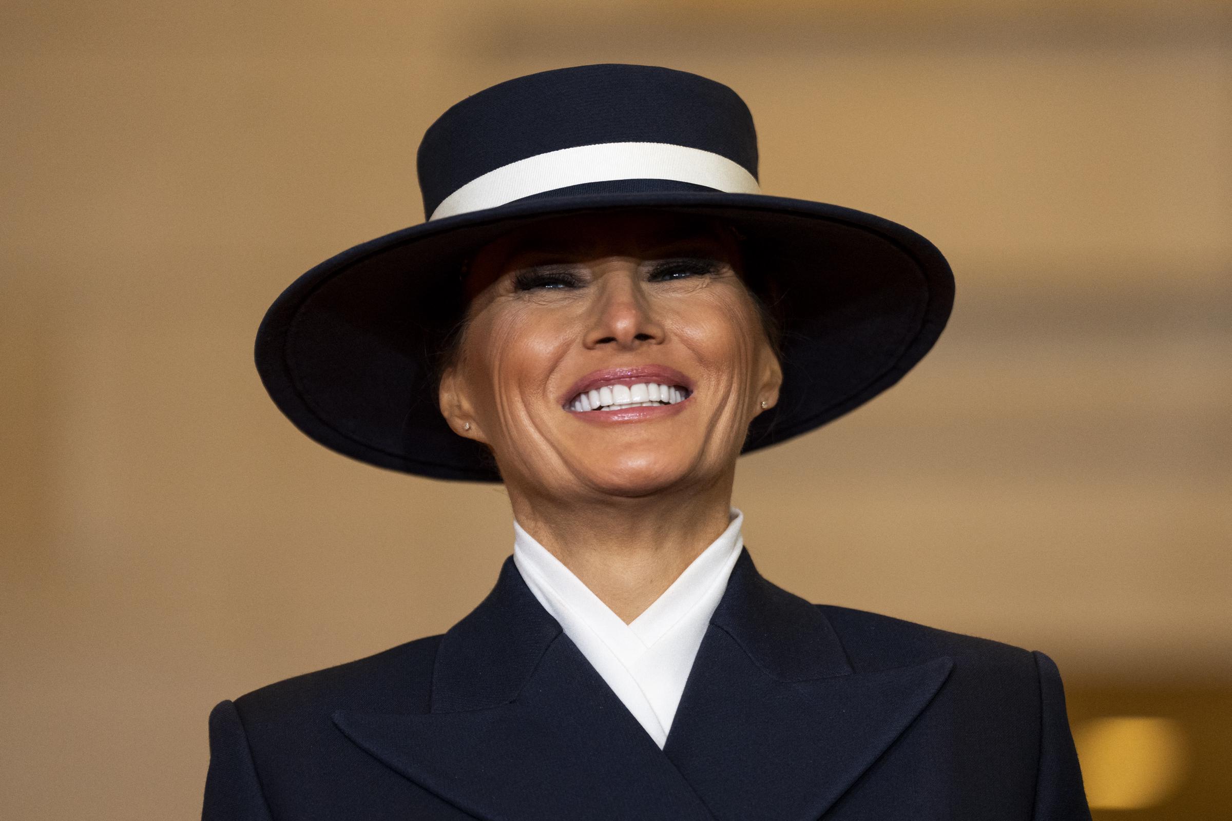 Melania Trump smiling at her husband's inauguration. | Source: Getty Images