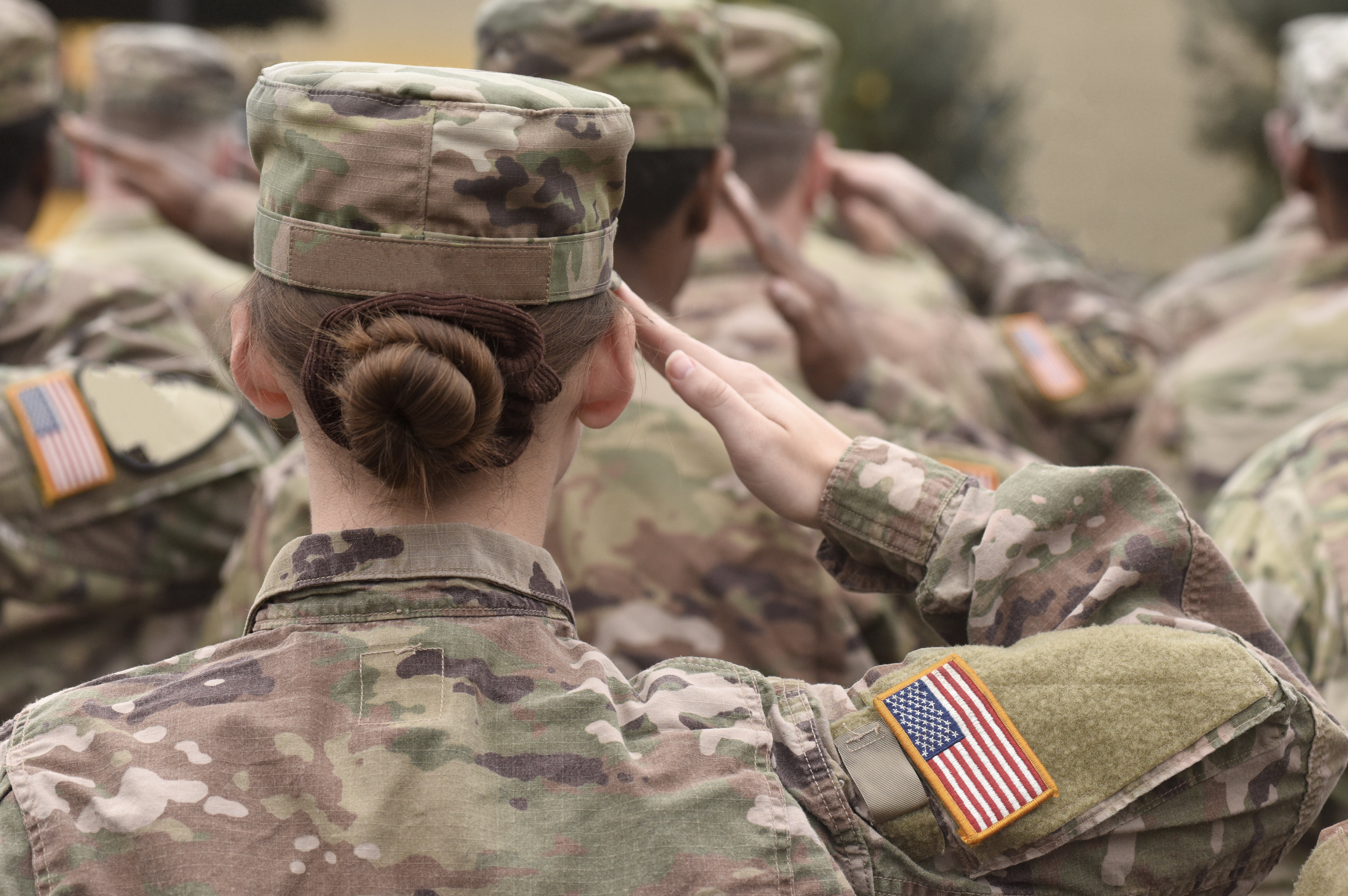 American soldiers salute during Veterans Day | Photo: Shutterstock