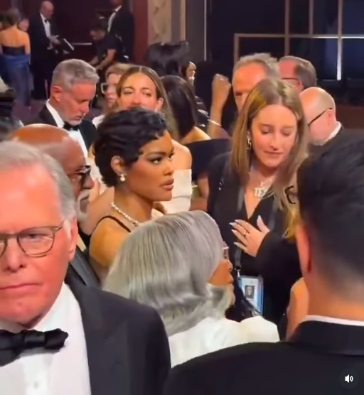 Teyana Taylor looks on after the heated exchange with the security guard. | Source: Instagram/popbase