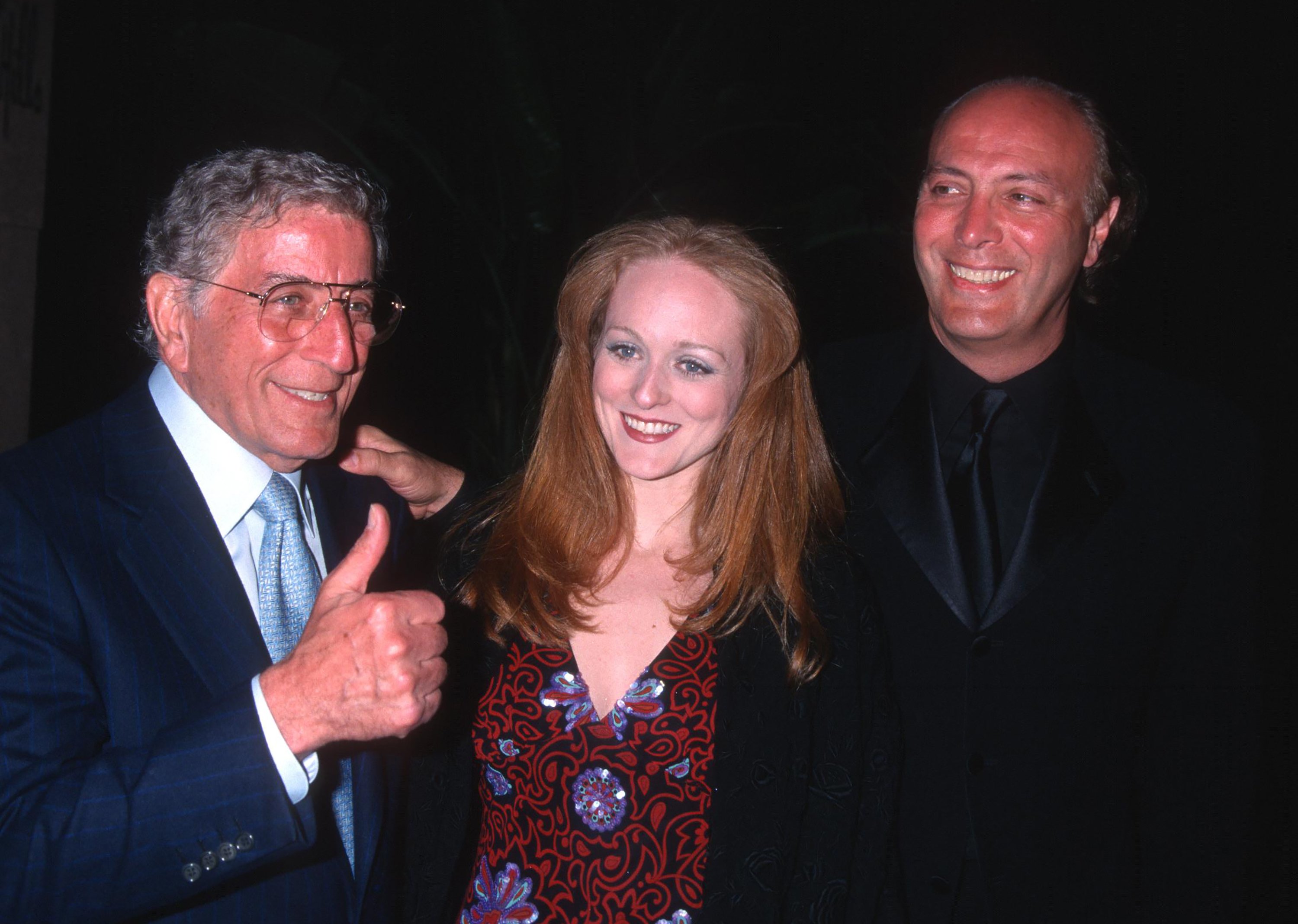 Tony Bennett, his daughter, singer Antonia Bennett, and son, producer Danny Bennett, at the Clive Davis pre-Grammy party at the Beverly Hills Hotel, Beverly Hills, California, February 26, 2002. | Source: Getty Images