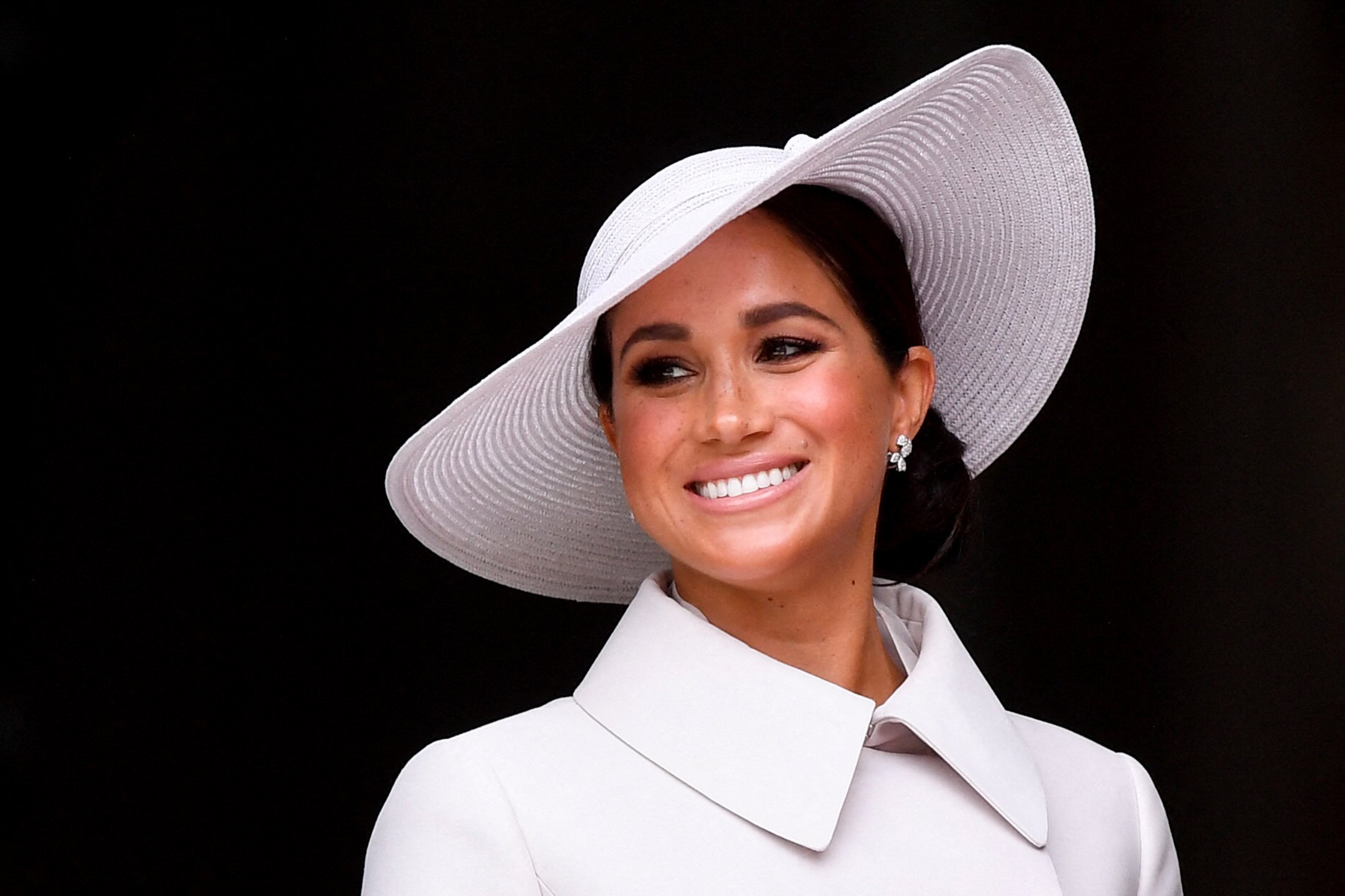 Meghan, Duchess of Sussex, smiles at the end of the National Service of Thanksgiving for The Queen's reign at Saint Paul's Cathedral in London on June 3, 2022 | Source: Getty Images
