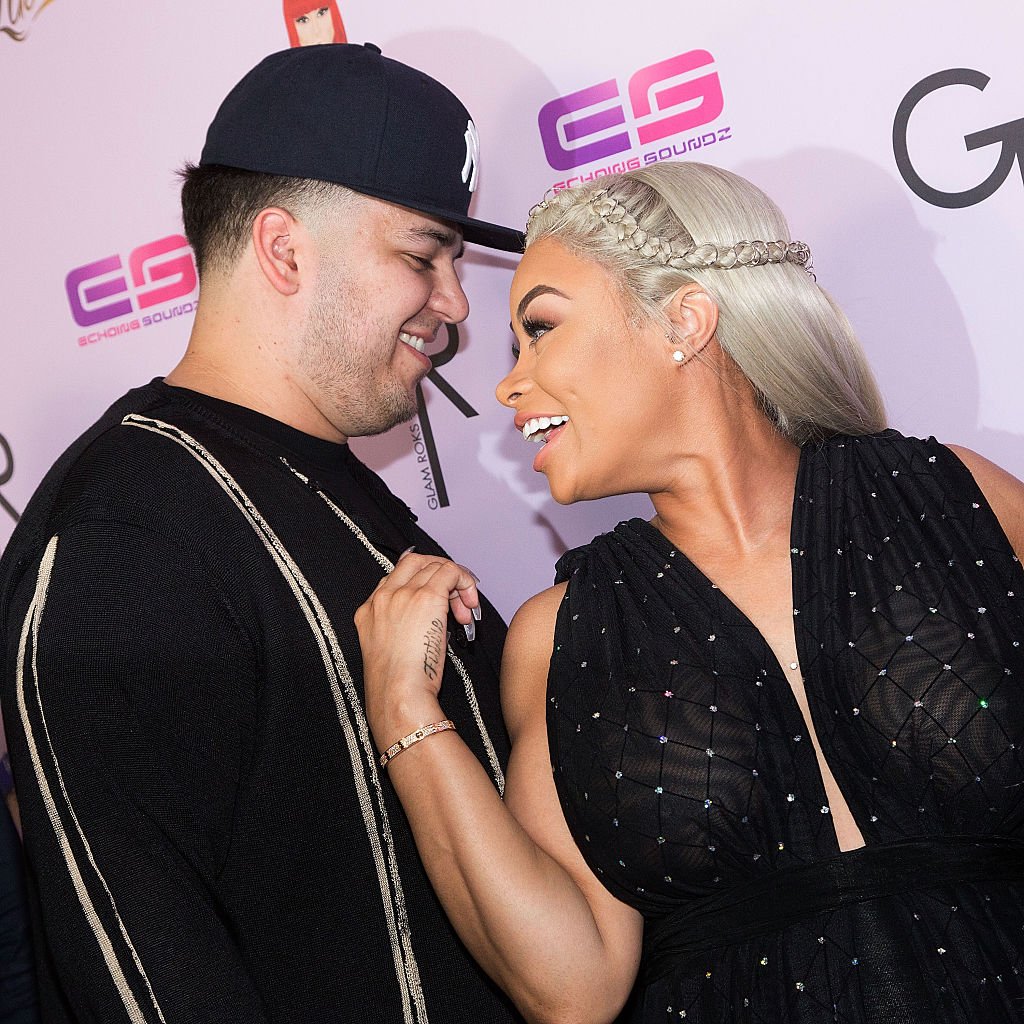 Blac Chyna and Rob Kardashian share a laugh as they arrived for her Blac Chyna's birthday celebration at the Hard Rock Café on May 10, 2016, in Hollywood, California | Source: Getty Images (Photo by Gabriel Olsen/WireImage)