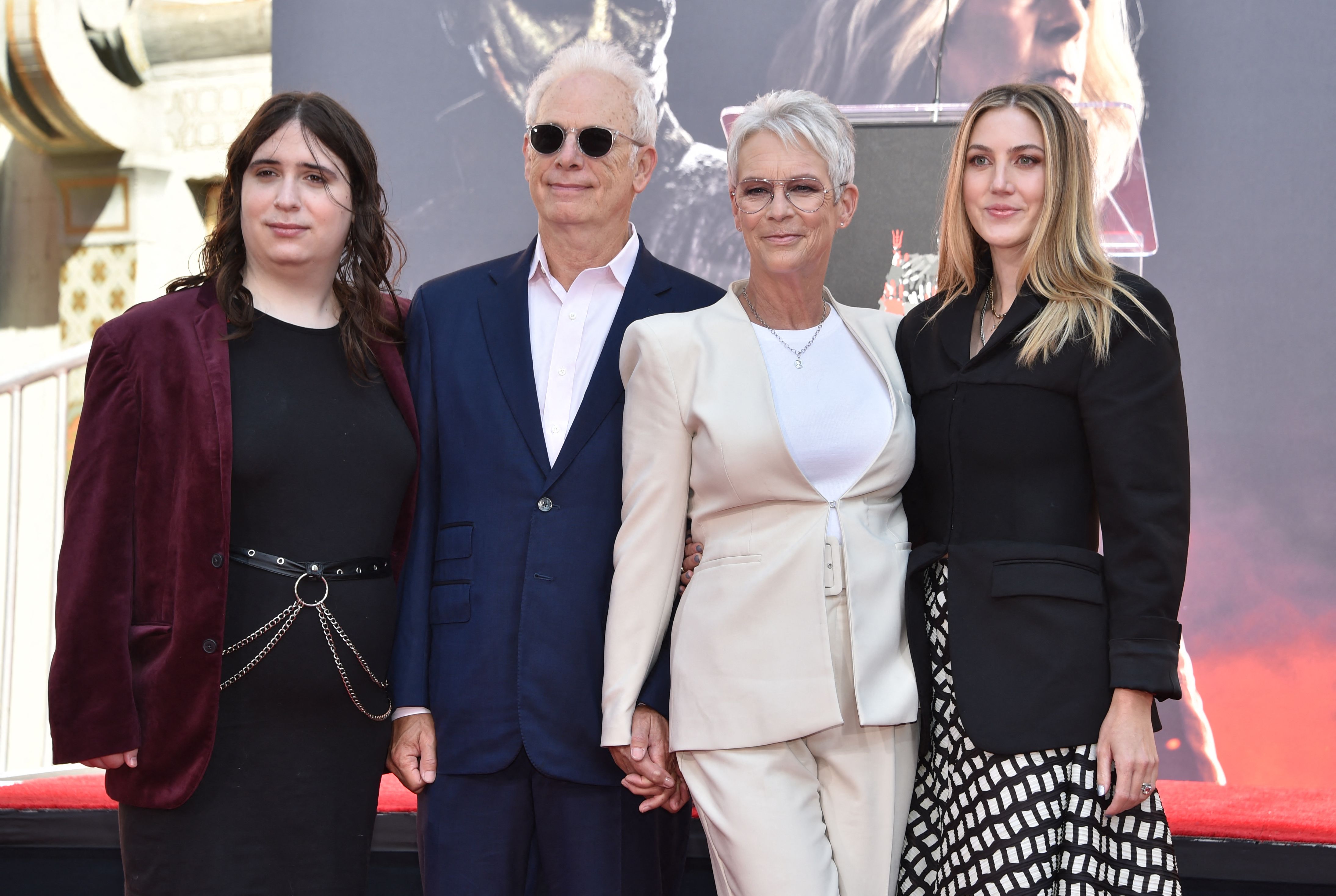 Ruby Guest, Christopher Guest, Jamie Lee Curtis and Annie Guest in the courtyard of the TCL Chinese theatre in Hollywood, California, on October 12, 2022 | Source: Getty Images
