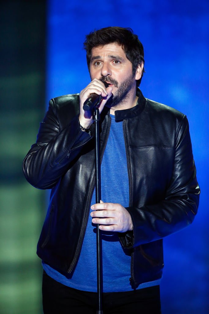 Le chanteur Patrick Fiori sur scène. | Photo : Getty Images