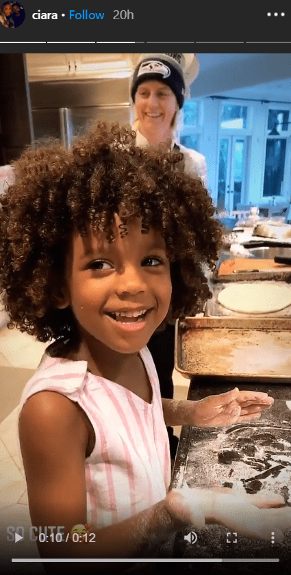 Ciara's daughter, Sienna, seen smiling at the camera while mixing dough in a recent Instagram story post. | Photo: Instagram/Ciara