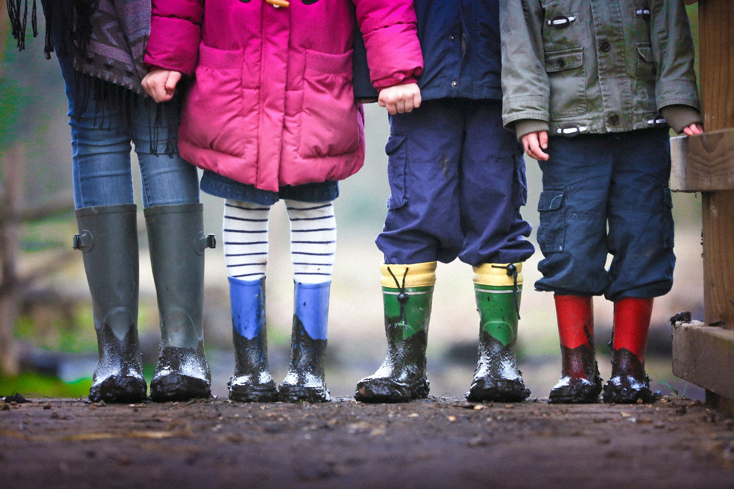 Children standing together in the rain | Source: Unsplash