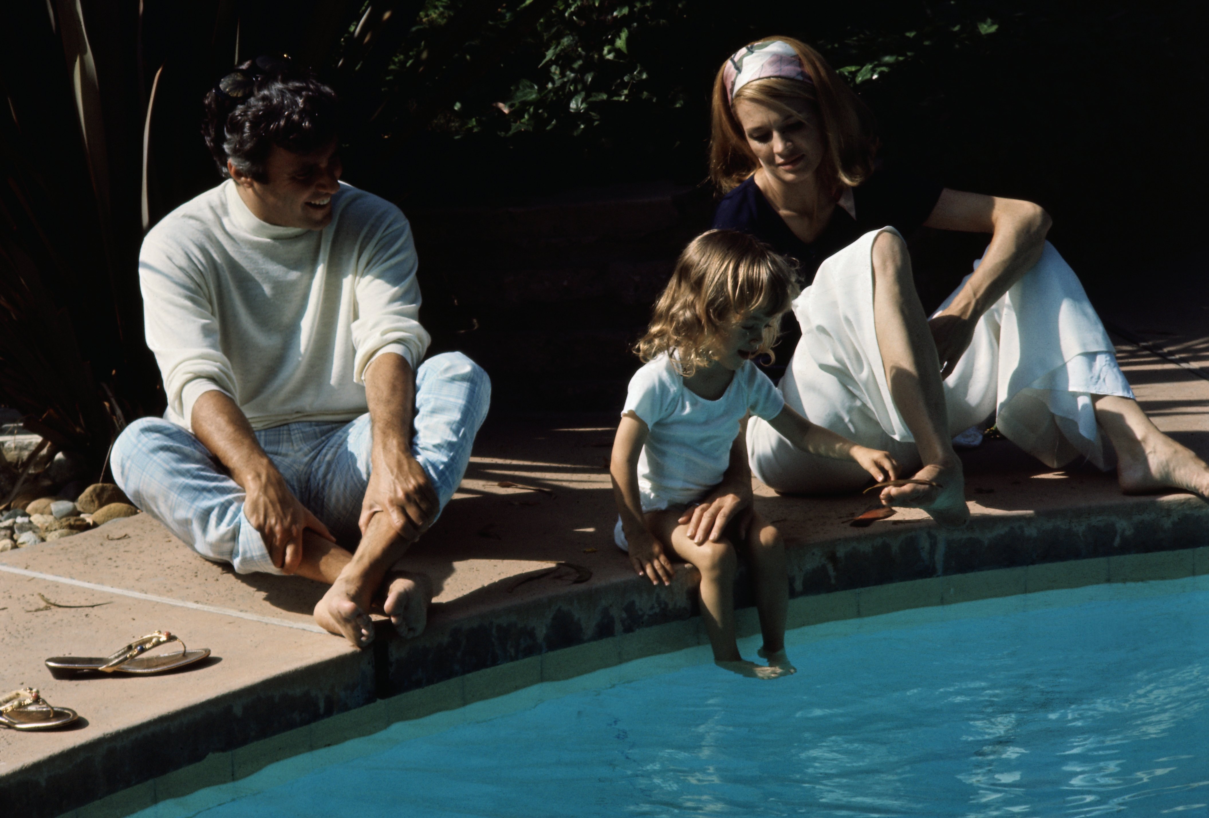 Burt Bacharach, Angie Dickinson, and Lea Nikki in their Hollywood home June 3, 1969 | Source: Getty Images