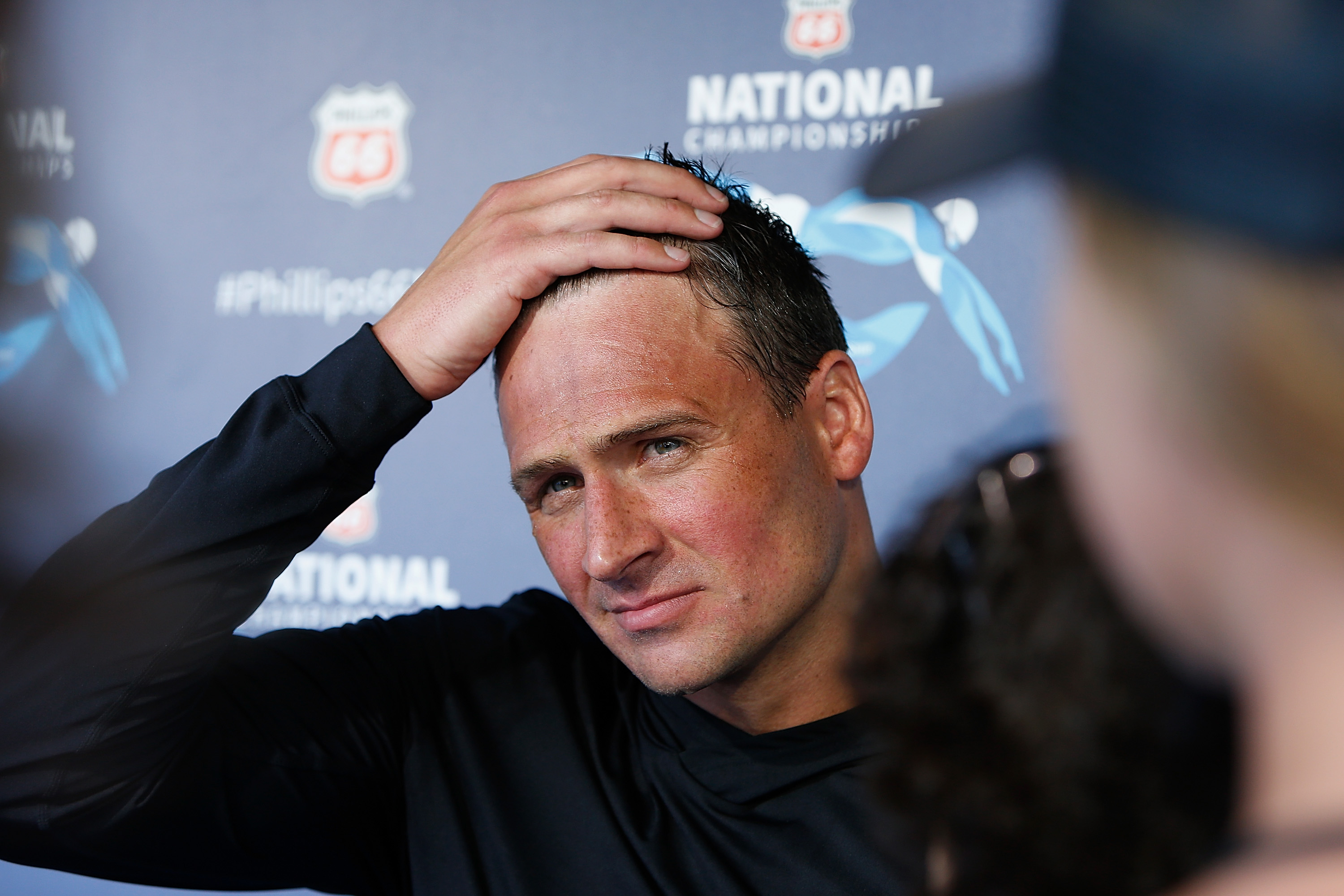 Ryan Lochte speaks to the media after winning the Men's 200m Individual Medley during the Phillips 66 National Championships in Stanford, California, on August 4, 2019. | Source: Getty Images