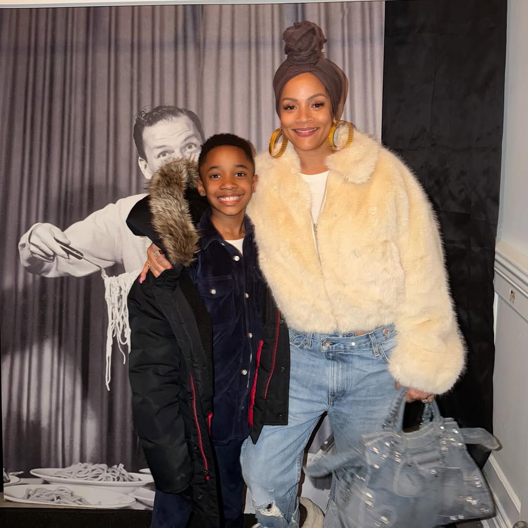 Italia Anita Smith pictured with her son King, dated March 14, 2026 | Source: Instagram/sislovespurple