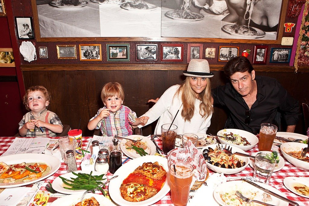 Actor Charlie Sheen, Brooke Mueller, sons Max Sheen and son Bob Sheen celebrate Charlie Sheen's his birthday with family at Buca di Beppo on September 3, 2011  | Source: Getty Images