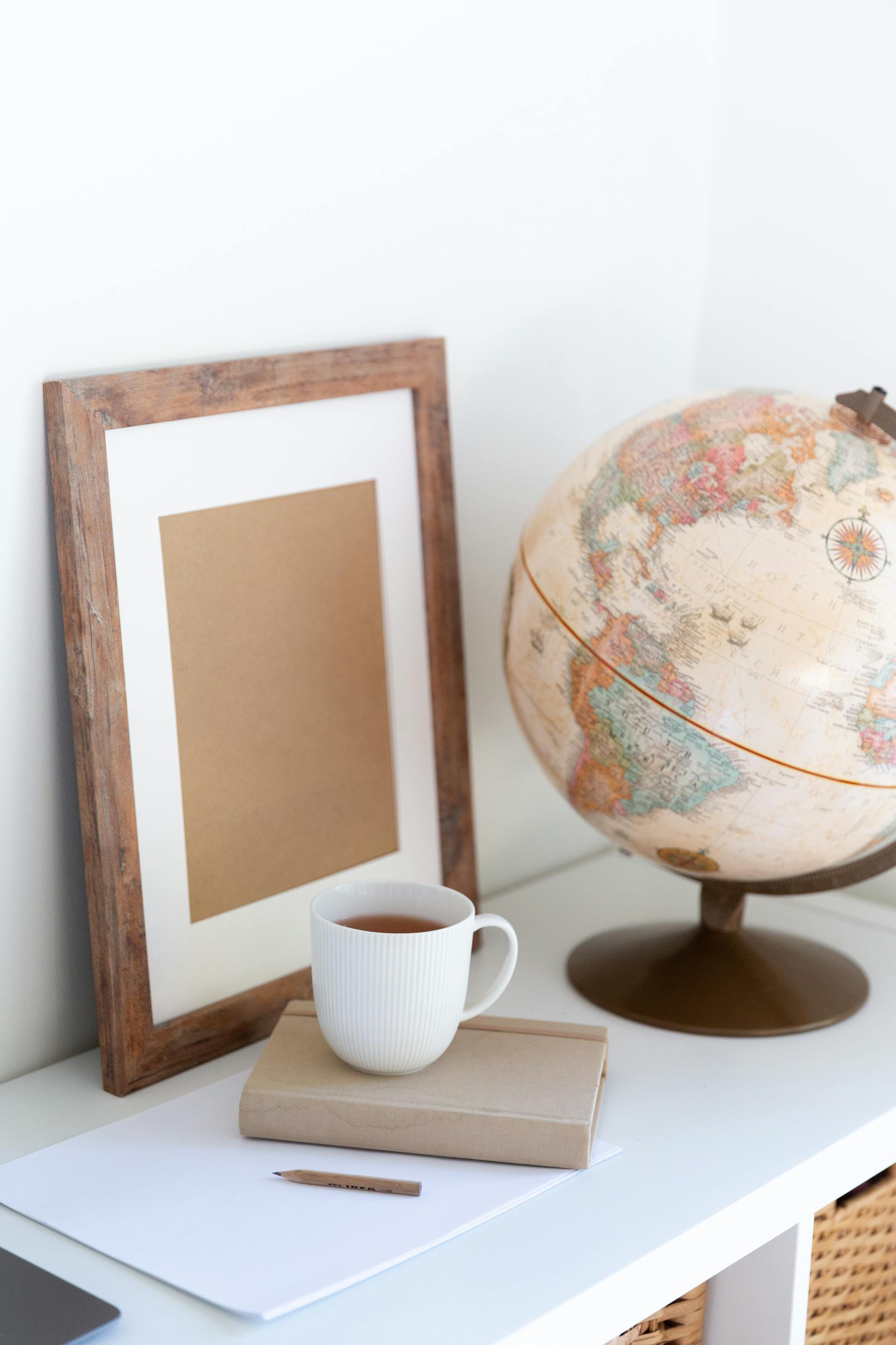 A vintage globe in a study | Source: Pexels