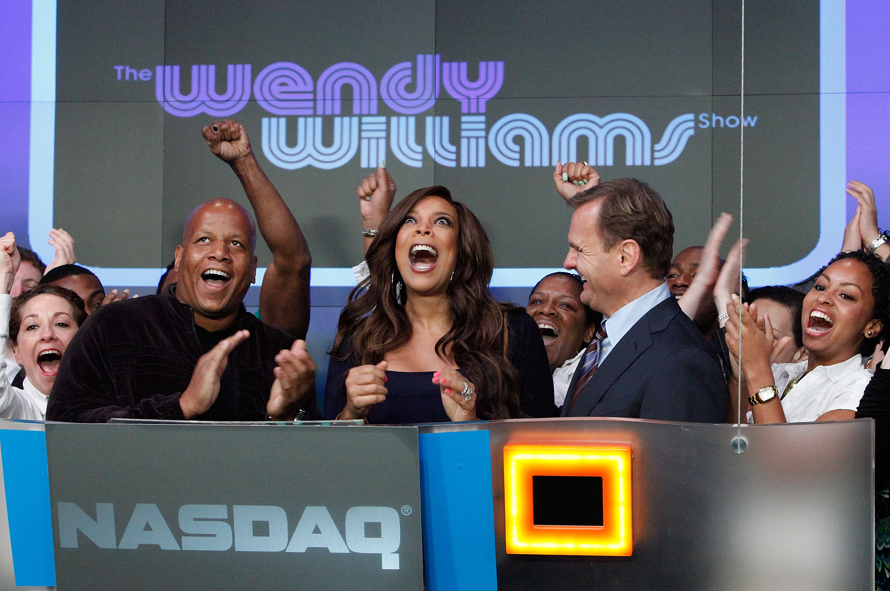 Kevin Hunter, Wendy Williams and Bruce Oust rings the opening bell at the NASDAQ MarketSite on August 25, 2010 in New York City | Source: Getty Images