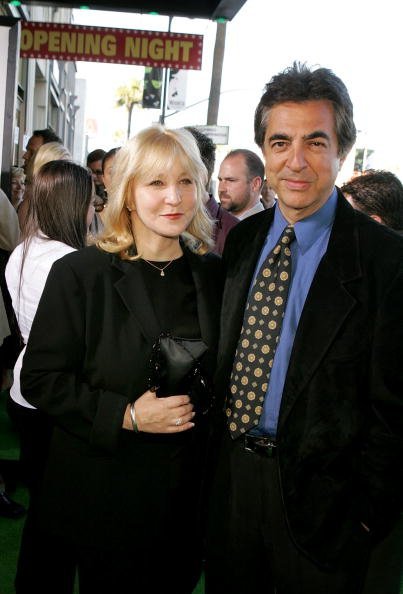 Joe Mantegna (R) and wife Arlene Vrhel arrive at the Los Angeles Premiere of the Broadway musical "Wicked" at the Pantages Theatre on June 22, 2005, in Hollywood, California. | Source: Getty Images.