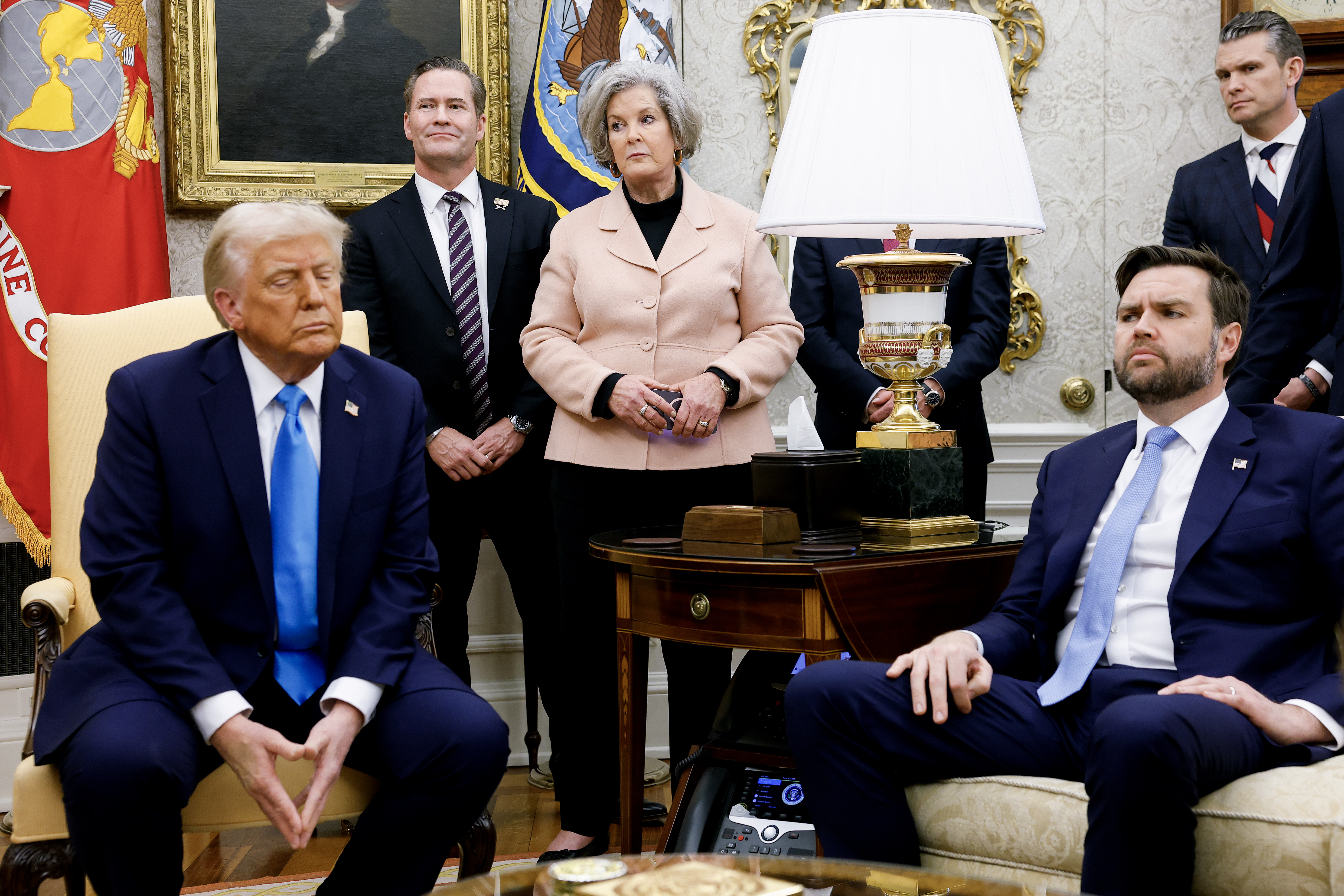 Susie Wiles stands between Michael Waltz and Pete Hegseth, as Donald Trump and JD Vance sit during a meeting in the Oval Office on February 4, 2025 | Source: Getty Images