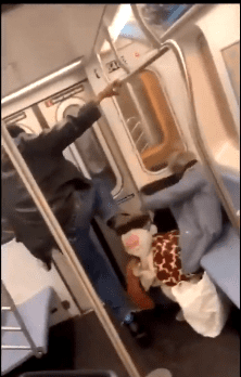 Man caught on camera kicking a 78-year-old woman on the train | Photo: YouTube/ Johnny Manila