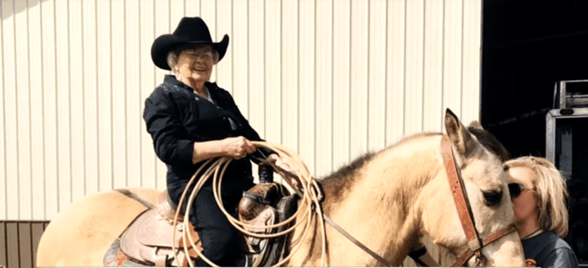 93-year-old Mildred Sandlin riding a horse for the first time | Photo: YouYube/CBS 42