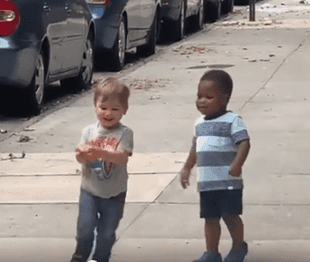 Two two-year-olds, Maxwell and Finnegan seen running to give each other a warm embrace | Photo: Facebook/MichaelDCisnerosNYC