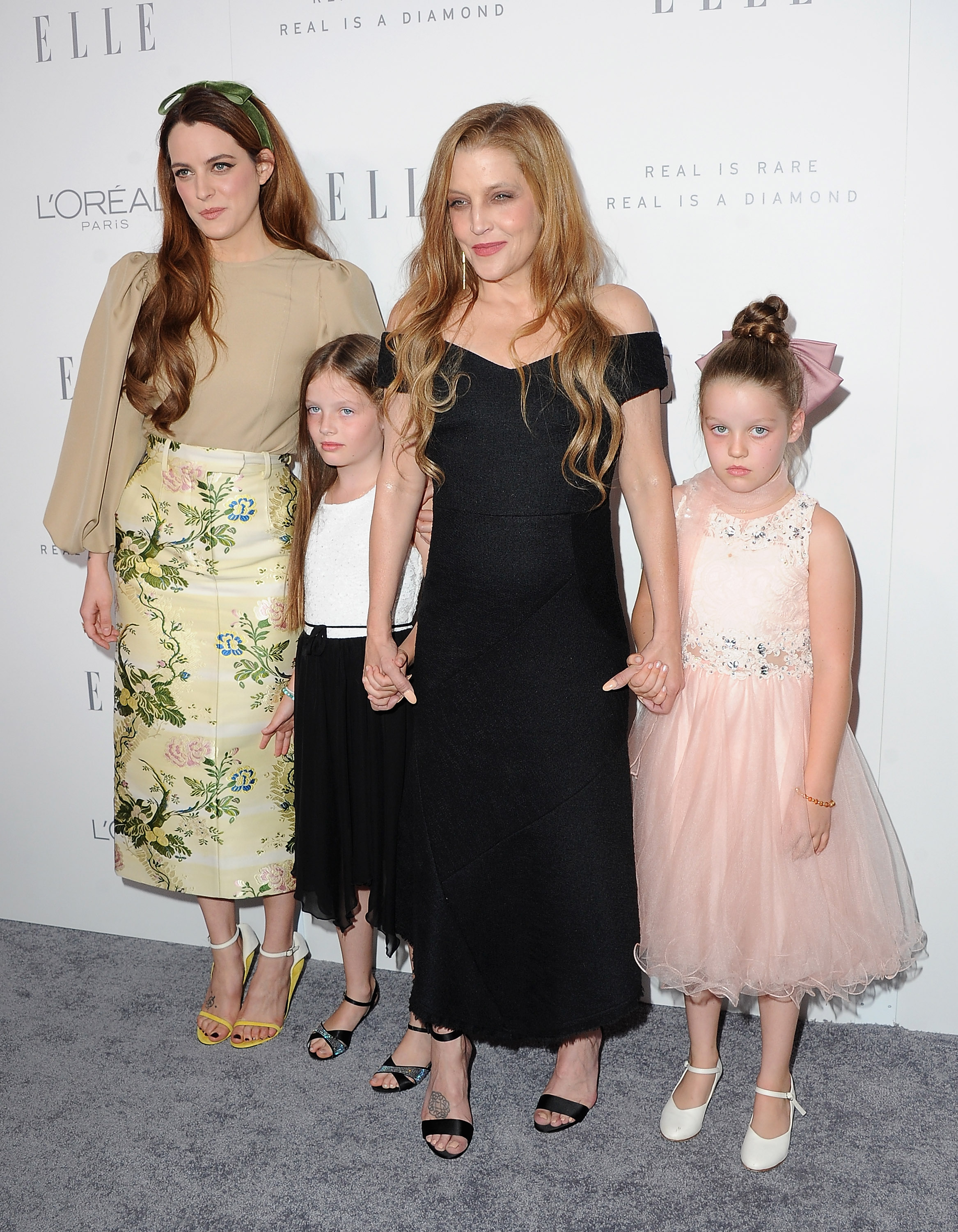 Riley Keough, Lisa Marie Presley, Harper Lockwood and Finely Lockwood arrive at ELLE's 24th Annual Women in Hollywood Celebration at Four Seasons Hotel Los Angeles at Beverly Hills on October 16, 2017 in Los Angeles, California. | Source: Getty Images
