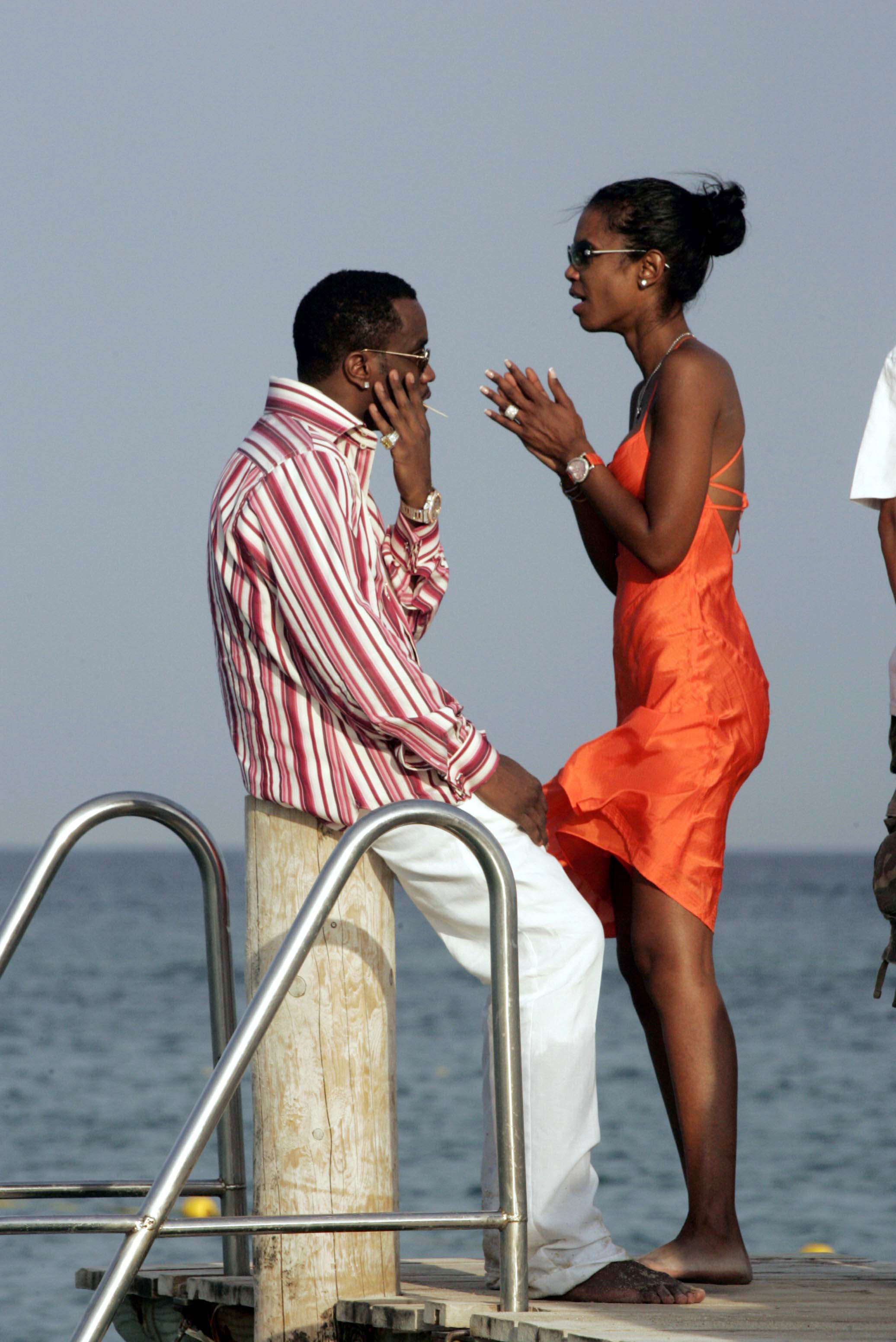 Diddy and Kim Porter are seen on Pampelonne Beach during lunch on July 26, 2004, in Saint Tropez, France. | Source: Getty Images