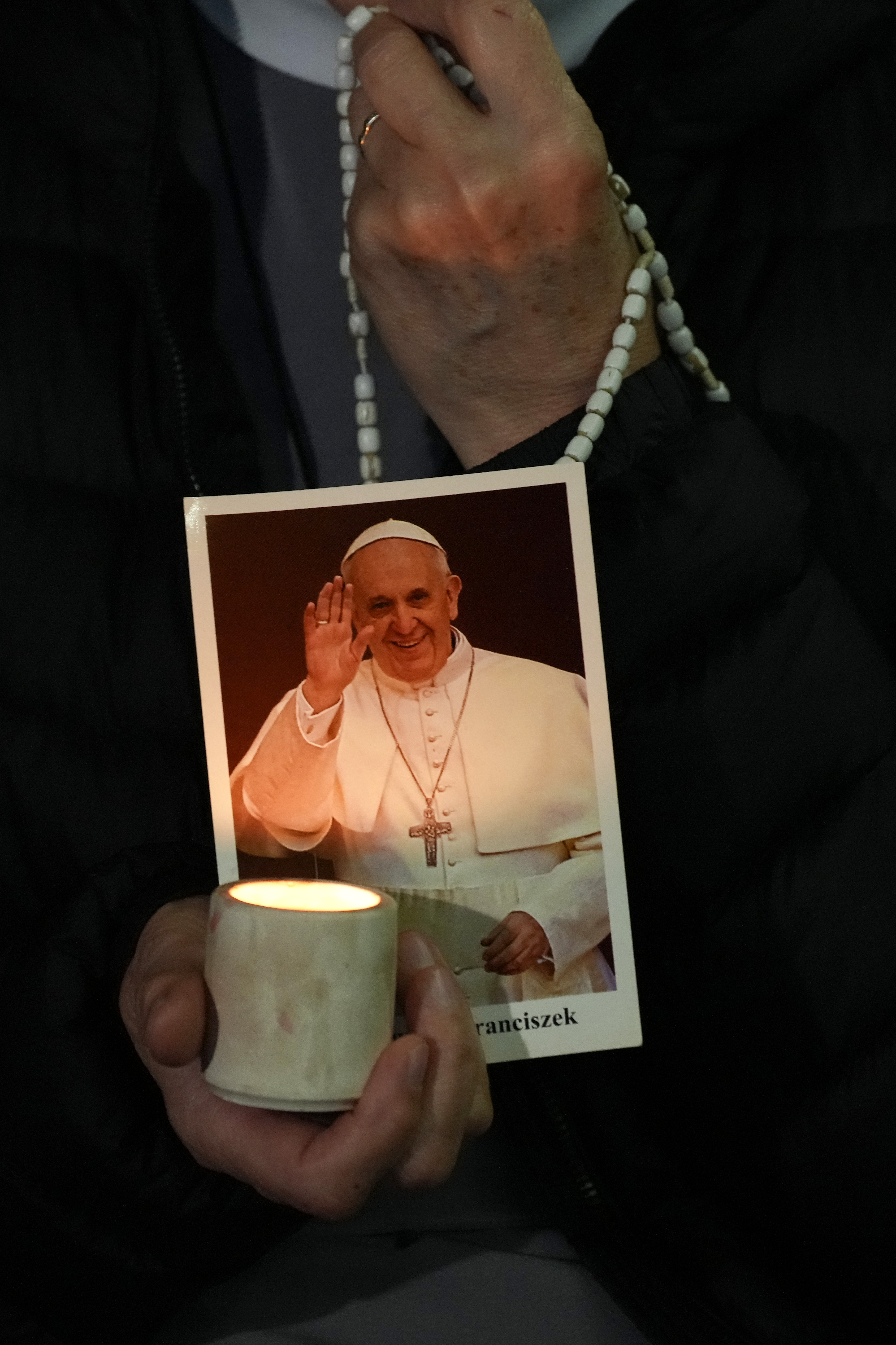 A nun prays during the rosary prayer service for the health of Pope Francis in St Peter's Square on March 6, 2025, in Vatican City, Italy | Source: Getty Images