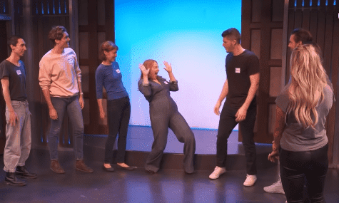 A group of aspiring comedians warm up during an improv class with Kim Kardashian and Scott Disick. | Source: YouTube/Keeping Up With The Kardashians.